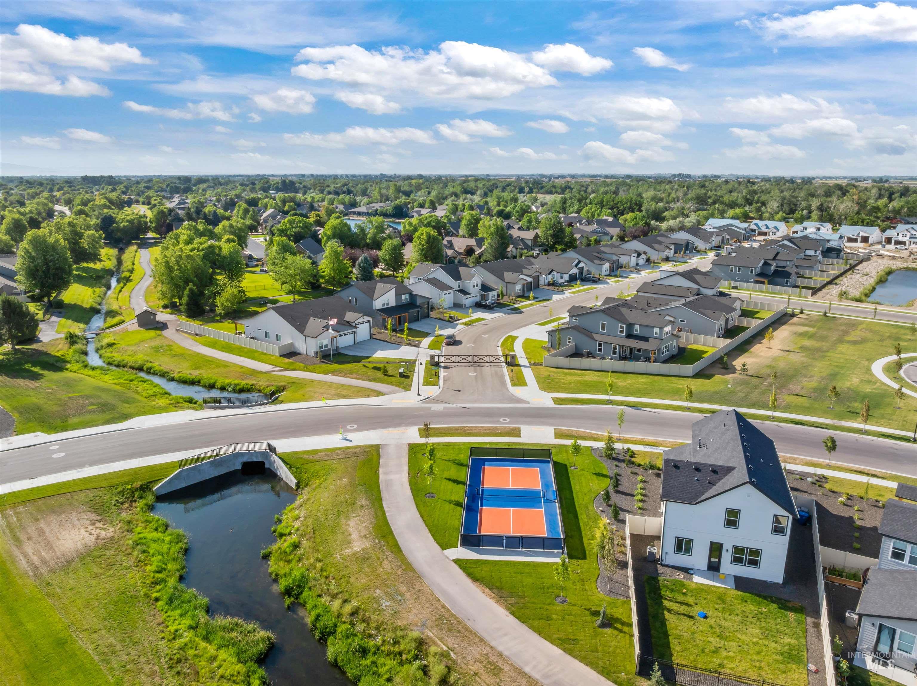Aerial view of residential area with a nearby body of water