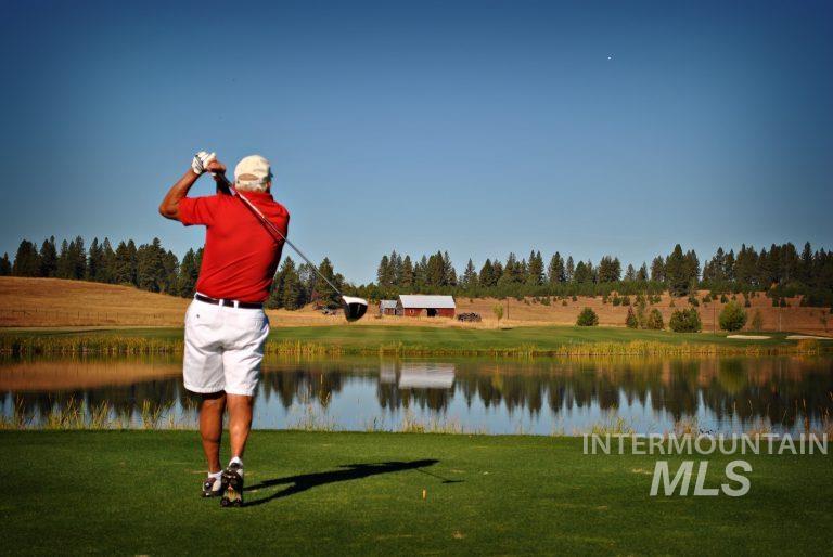 Water view featuring a heavily wooded area