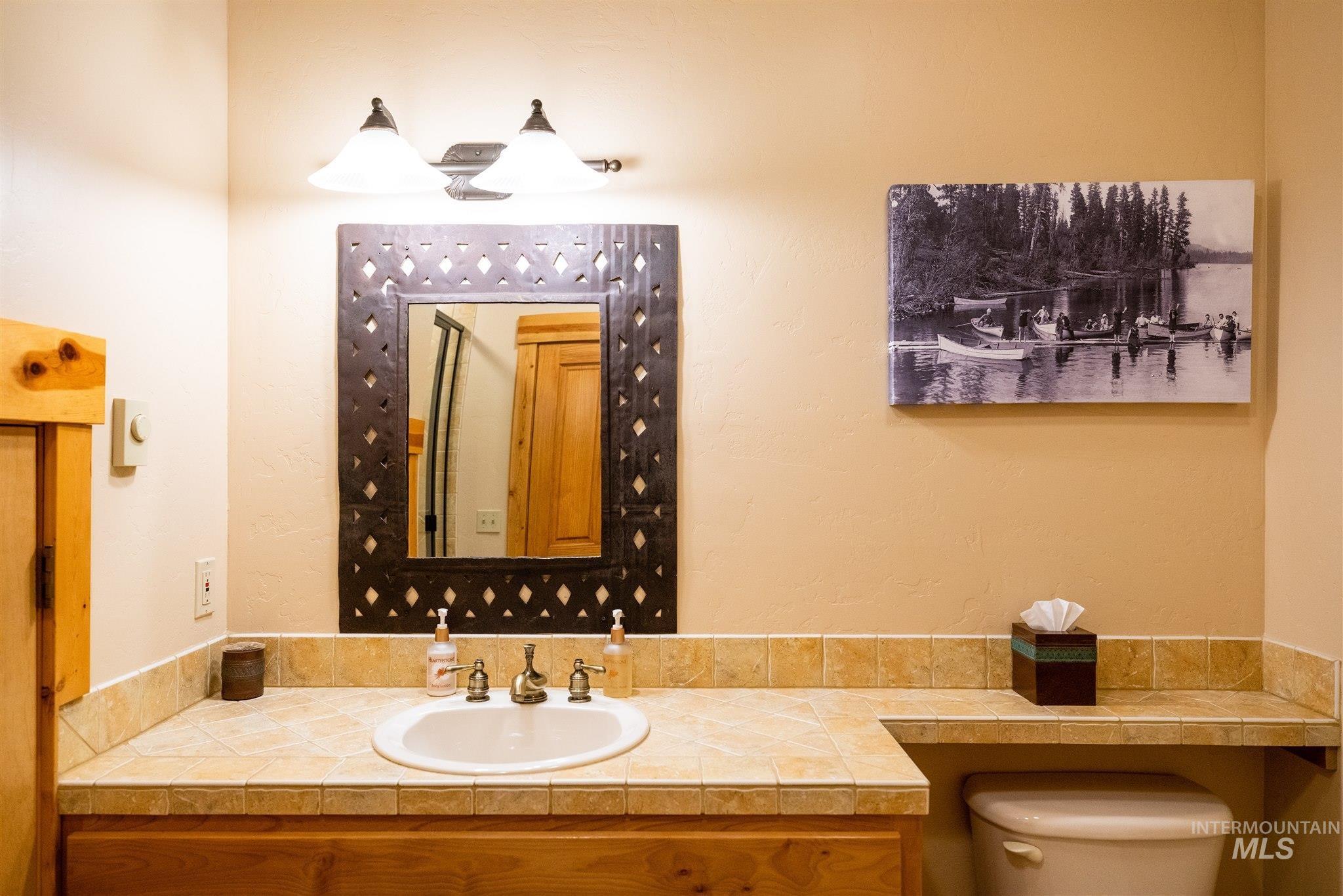 Half bath with toilet and vanity