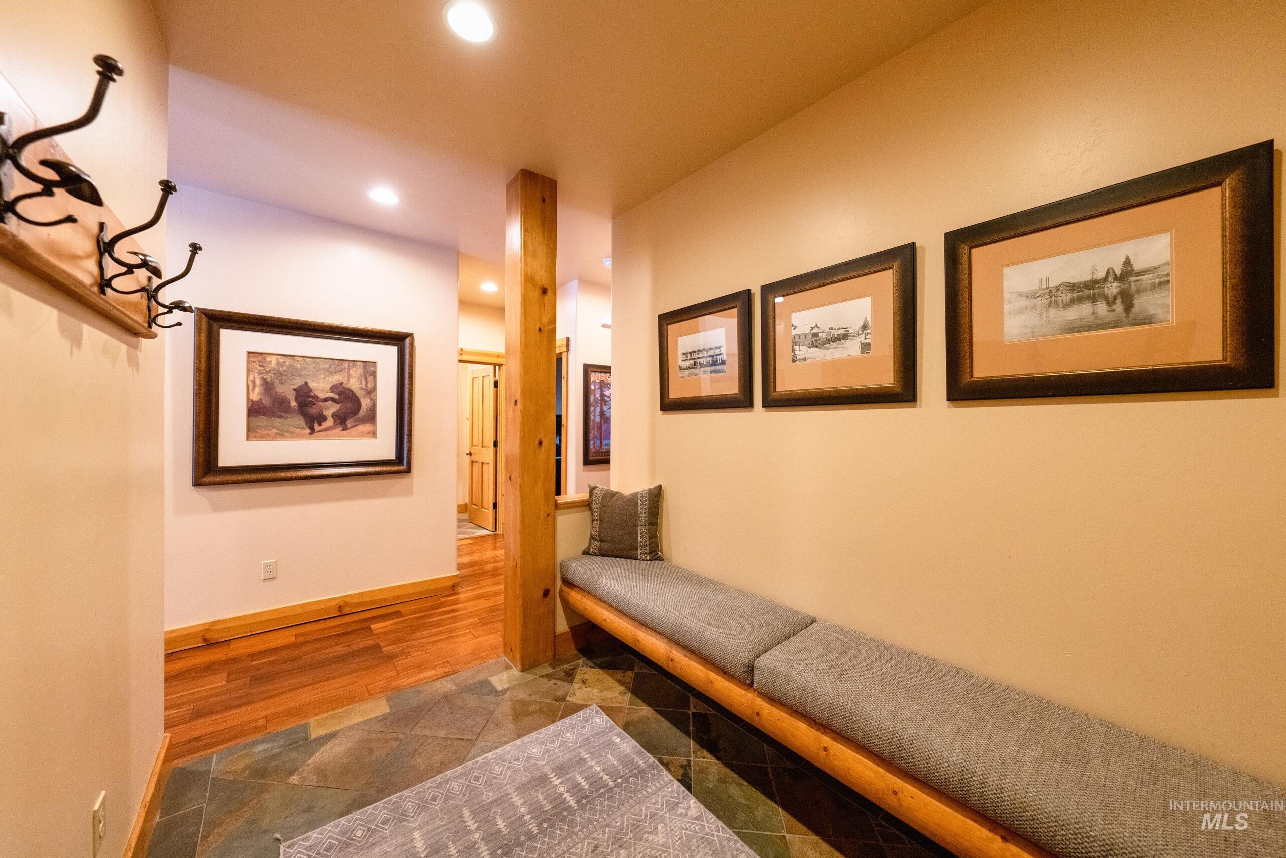 Corridor featuring recessed lighting and wood finished floors
