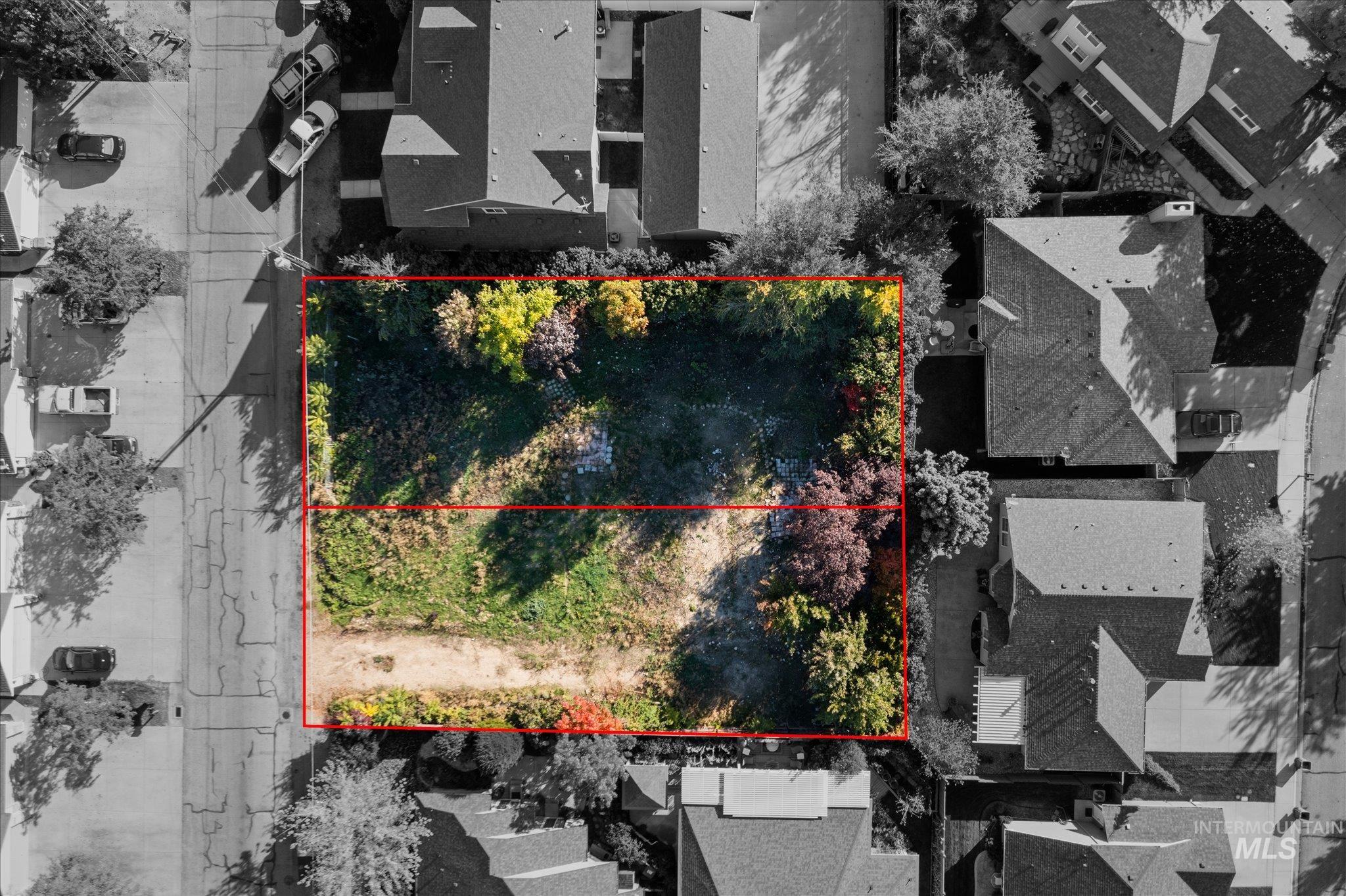 Aerial perspective of suburban area with property boundaries highlighted