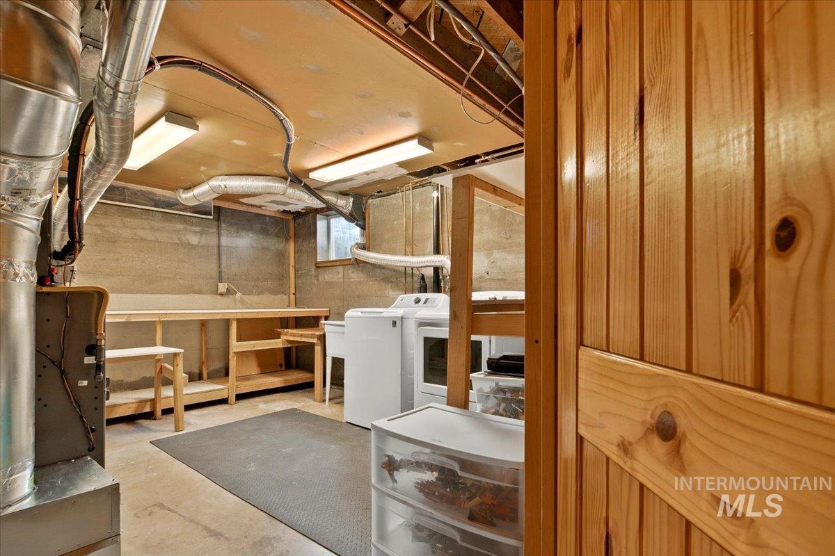 Basement featuring washing machine and dryer