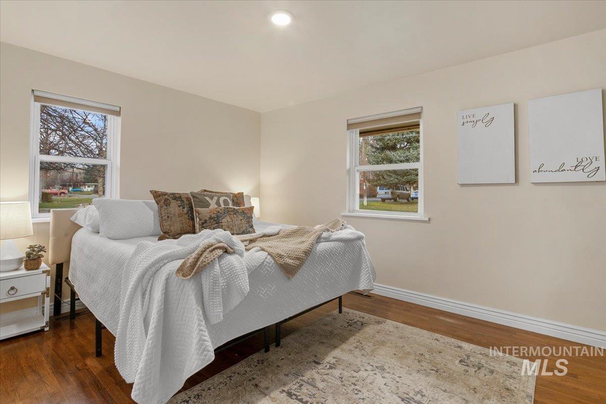 Bedroom featuring dark wood finished floors