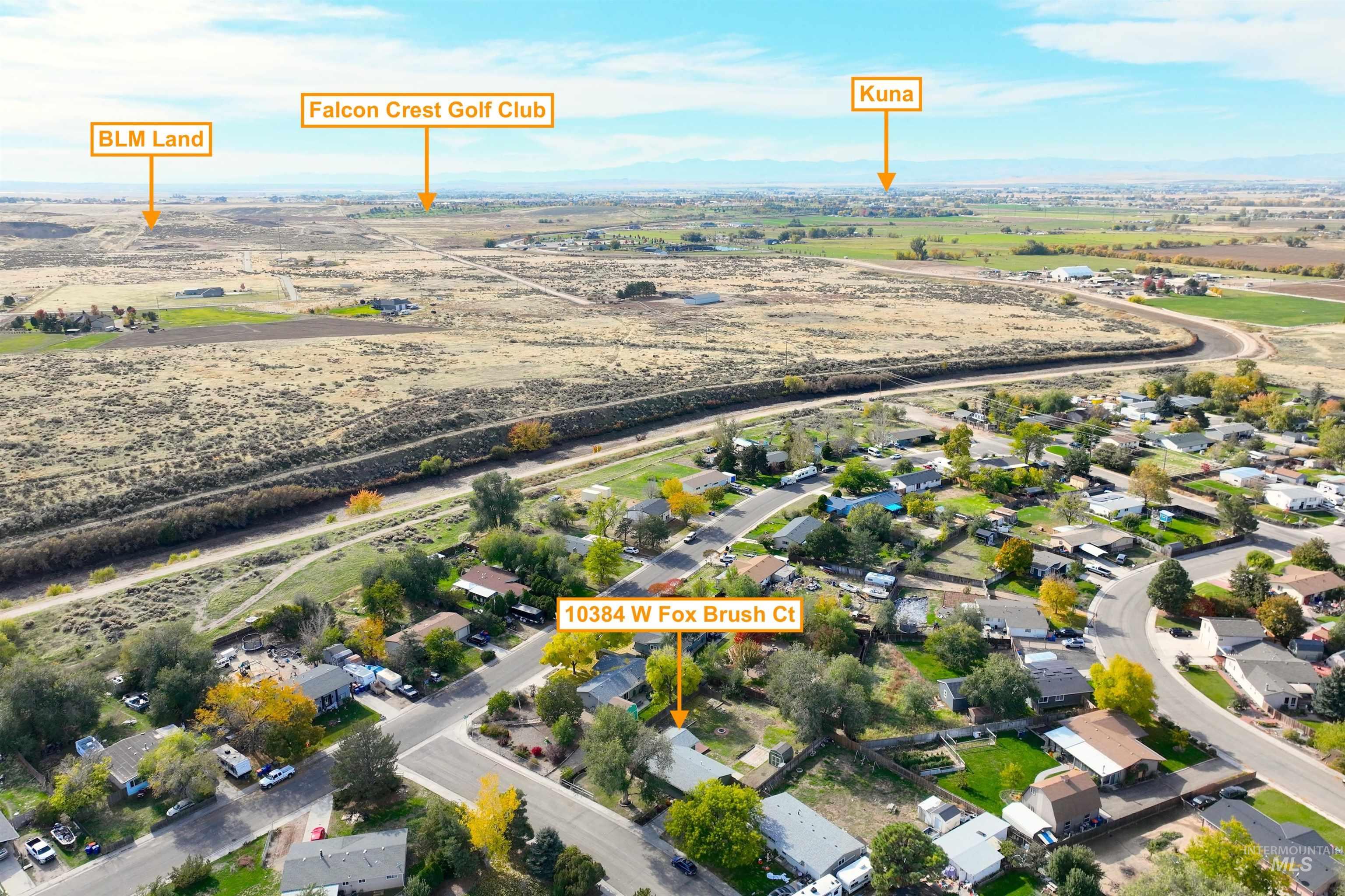 Aerial overview of property's location with nearby suburban area