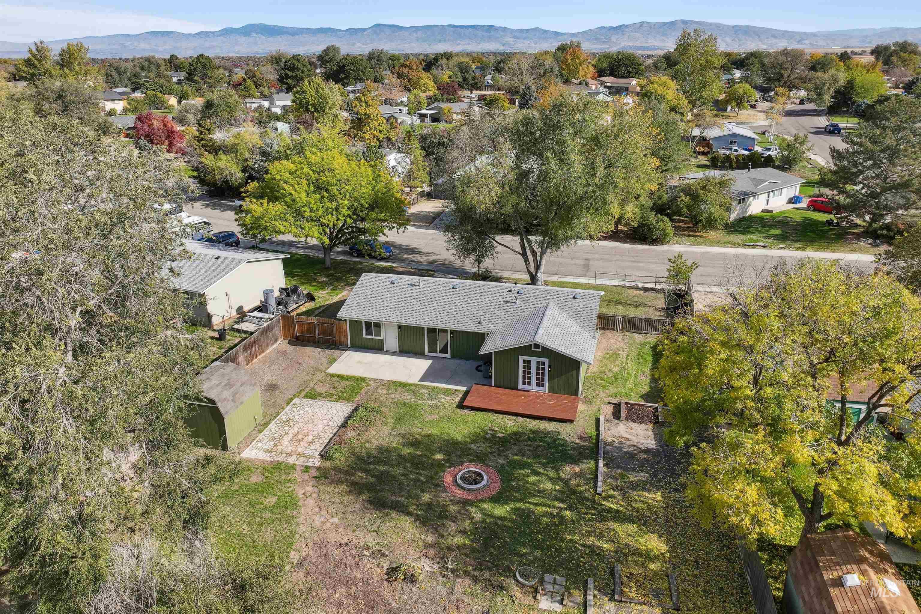Aerial view of residential area with mountains