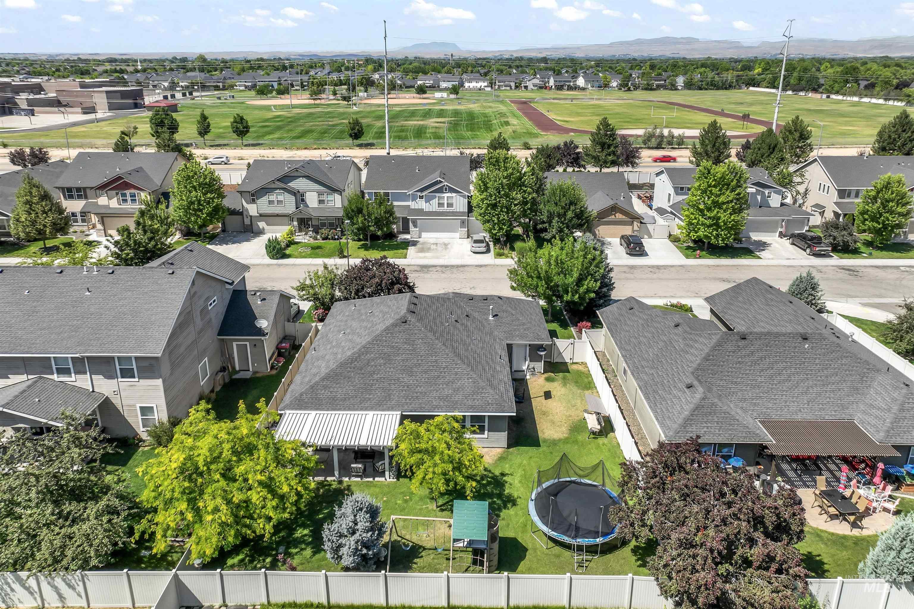 Aerial perspective of suburban area with mountains