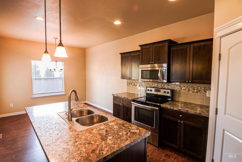 Photo of 947 Americana Circle, Twin Falls, ID 83301 (MLS # 98971811)