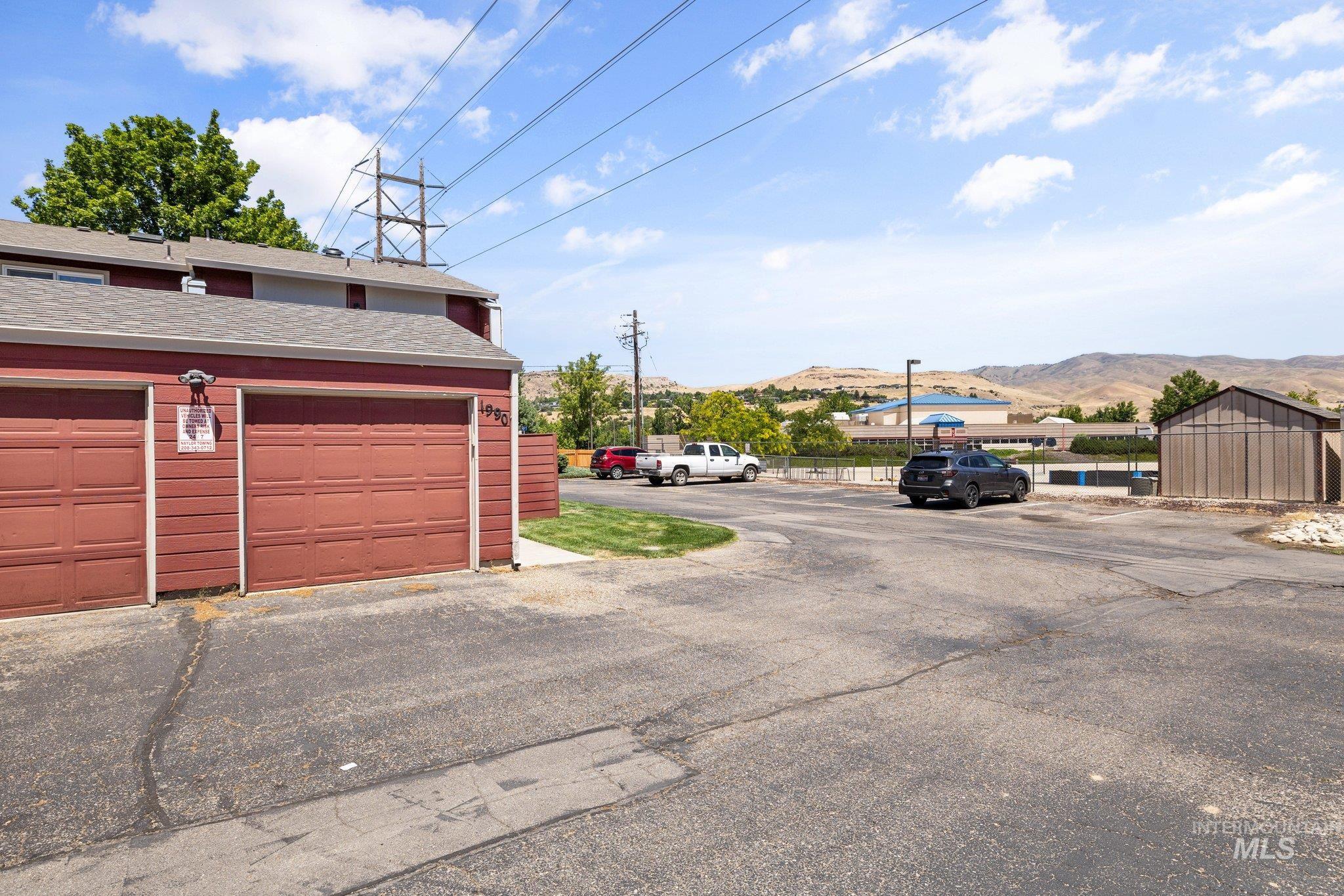 Garage featuring a mountain view