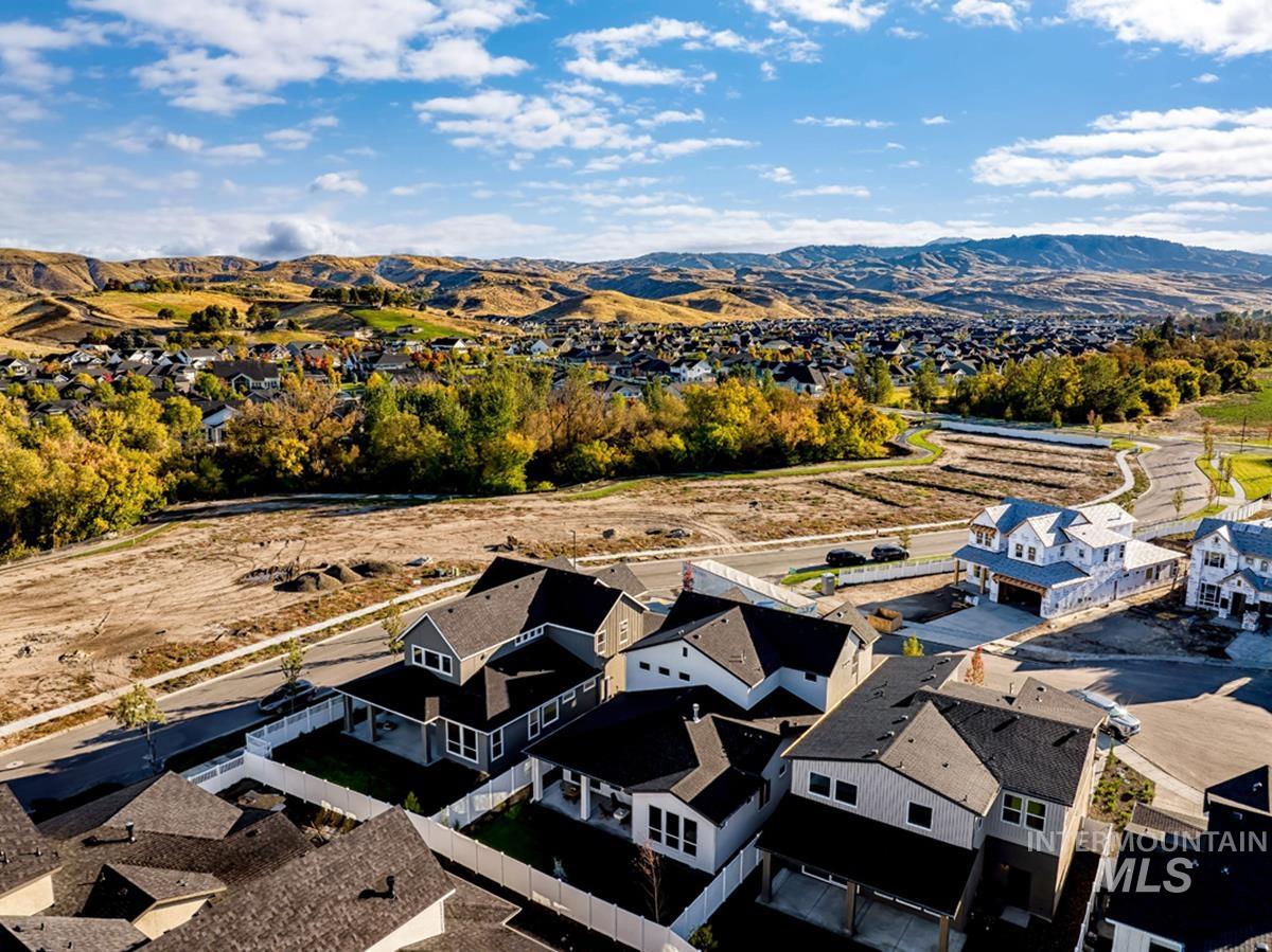 Aerial view of residential area with a mountainous background