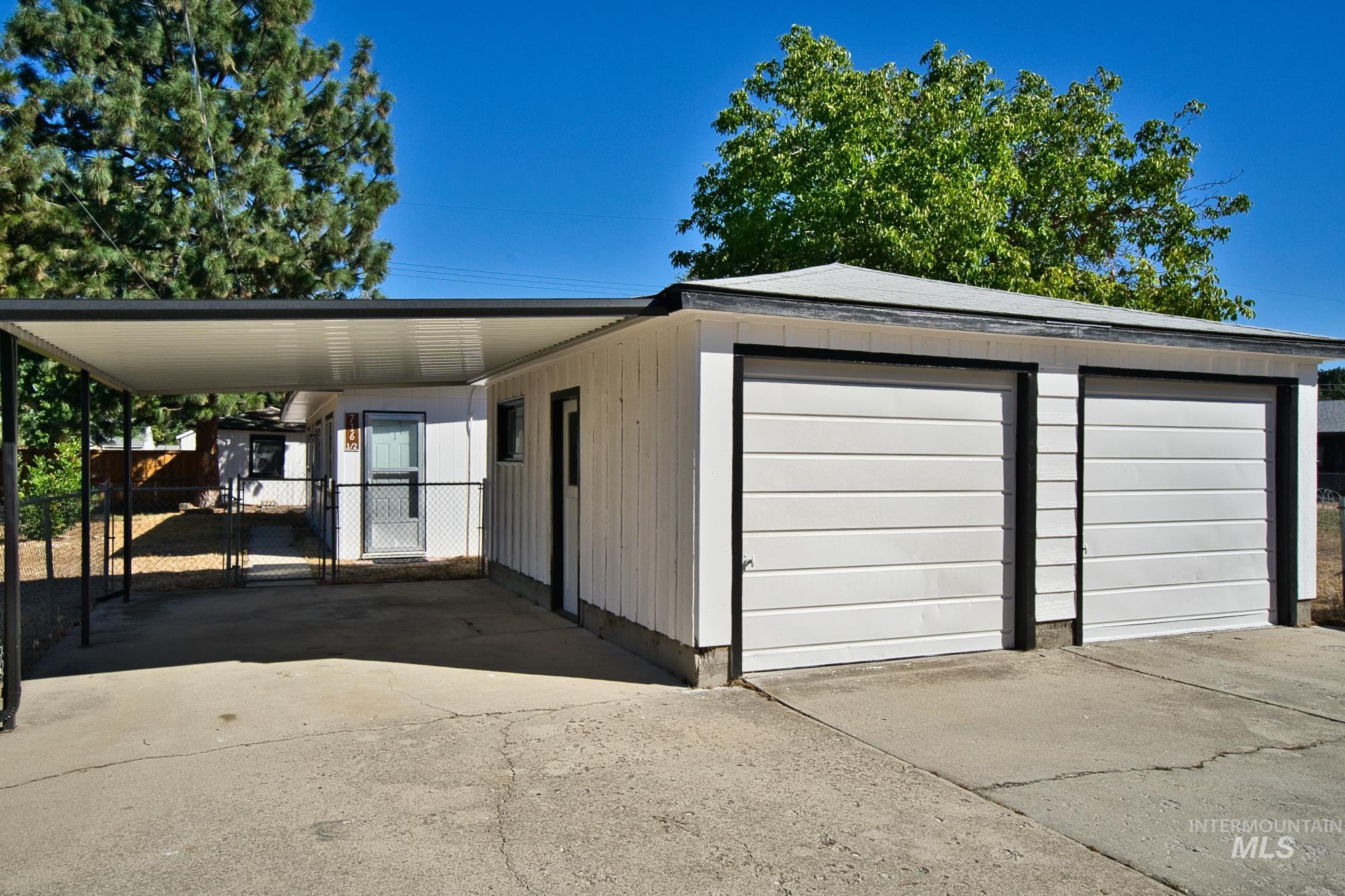 Garage with concrete driveway
