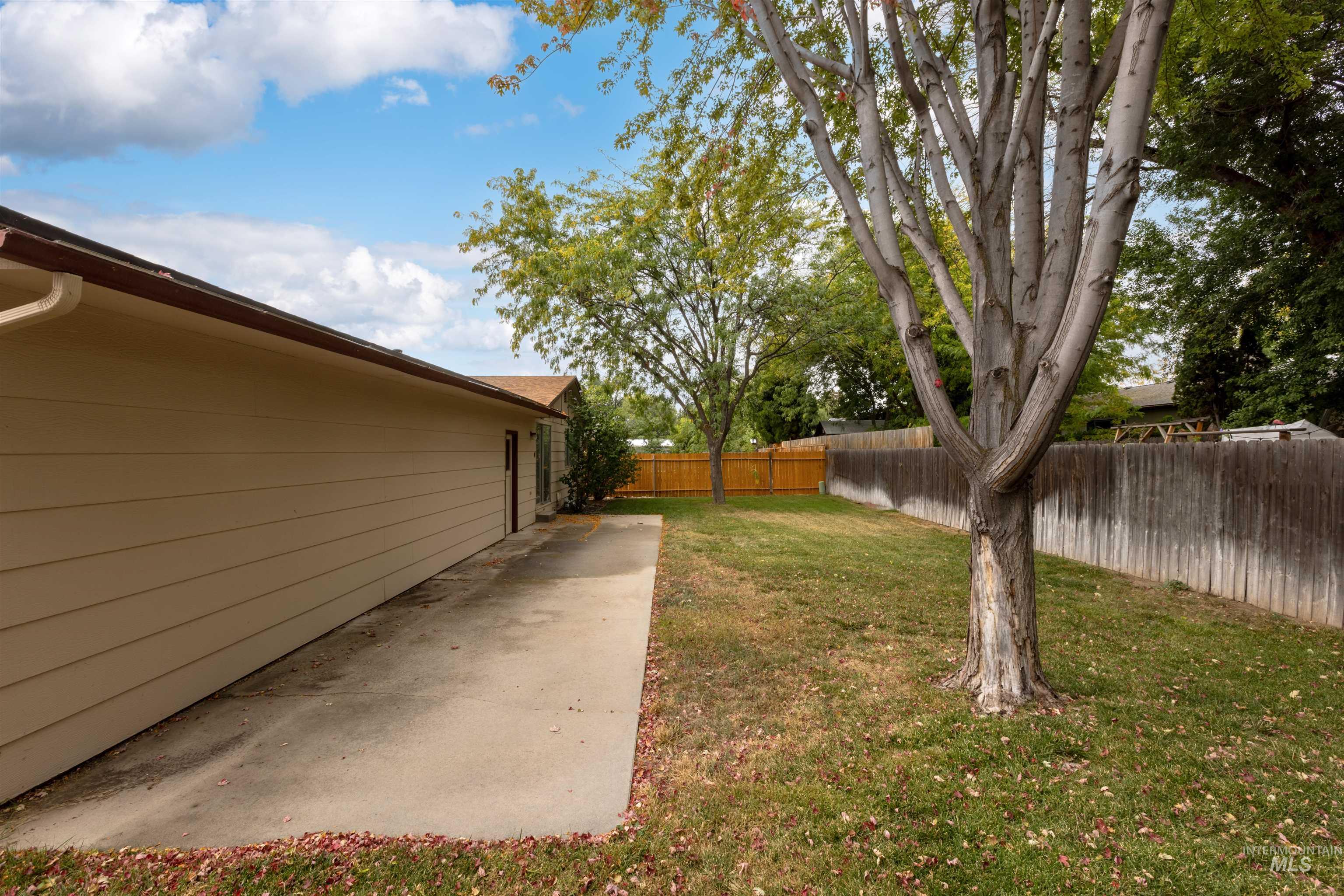 View of fenced backyard
