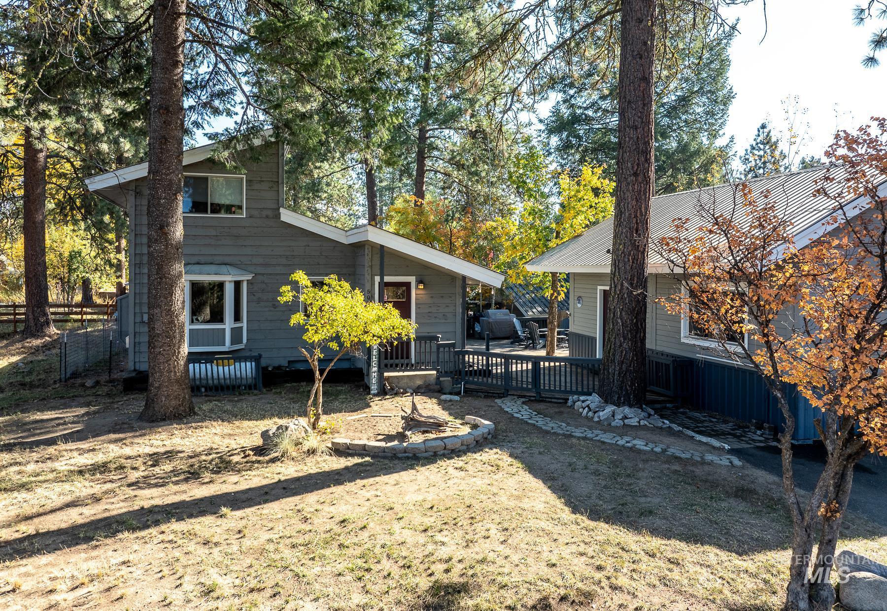 Rear view of property with a wooden deck