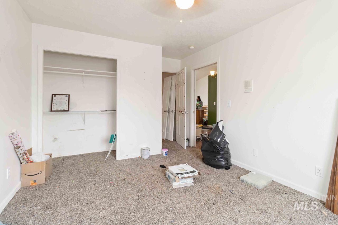 Bedroom featuring a closet and carpet