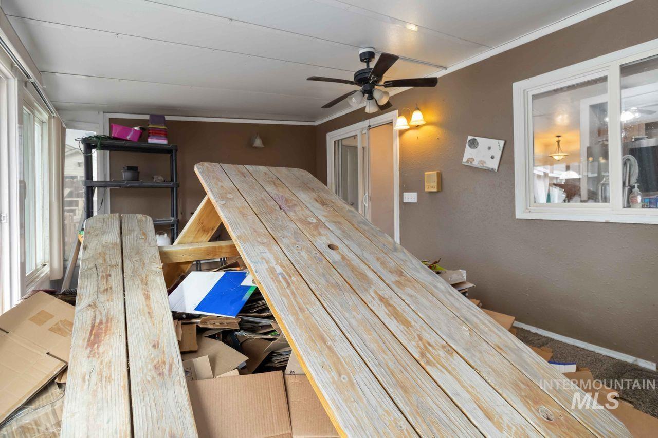 Sunroom / solarium with a barn door