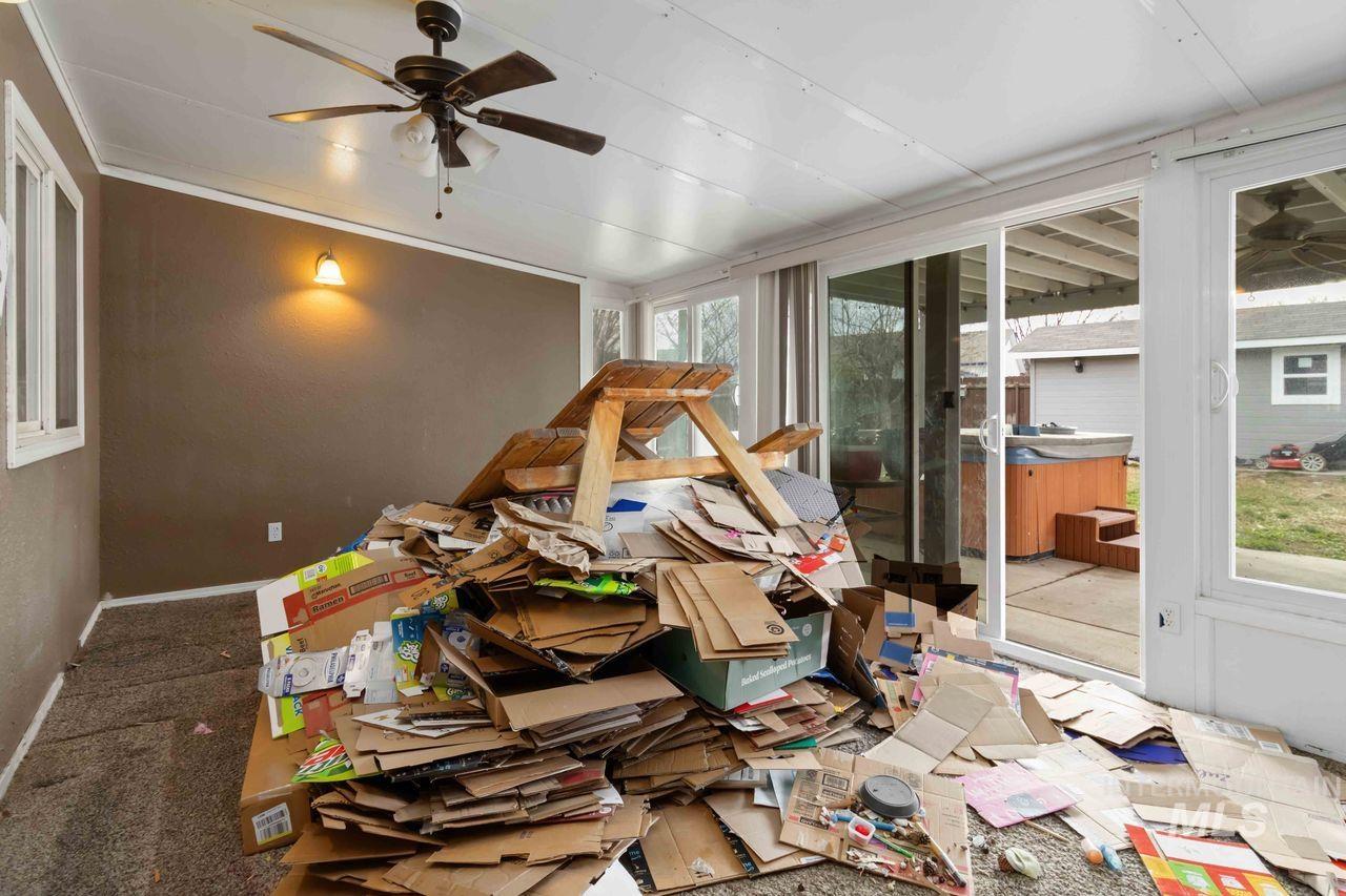 Spare room with a ceiling fan and carpet
