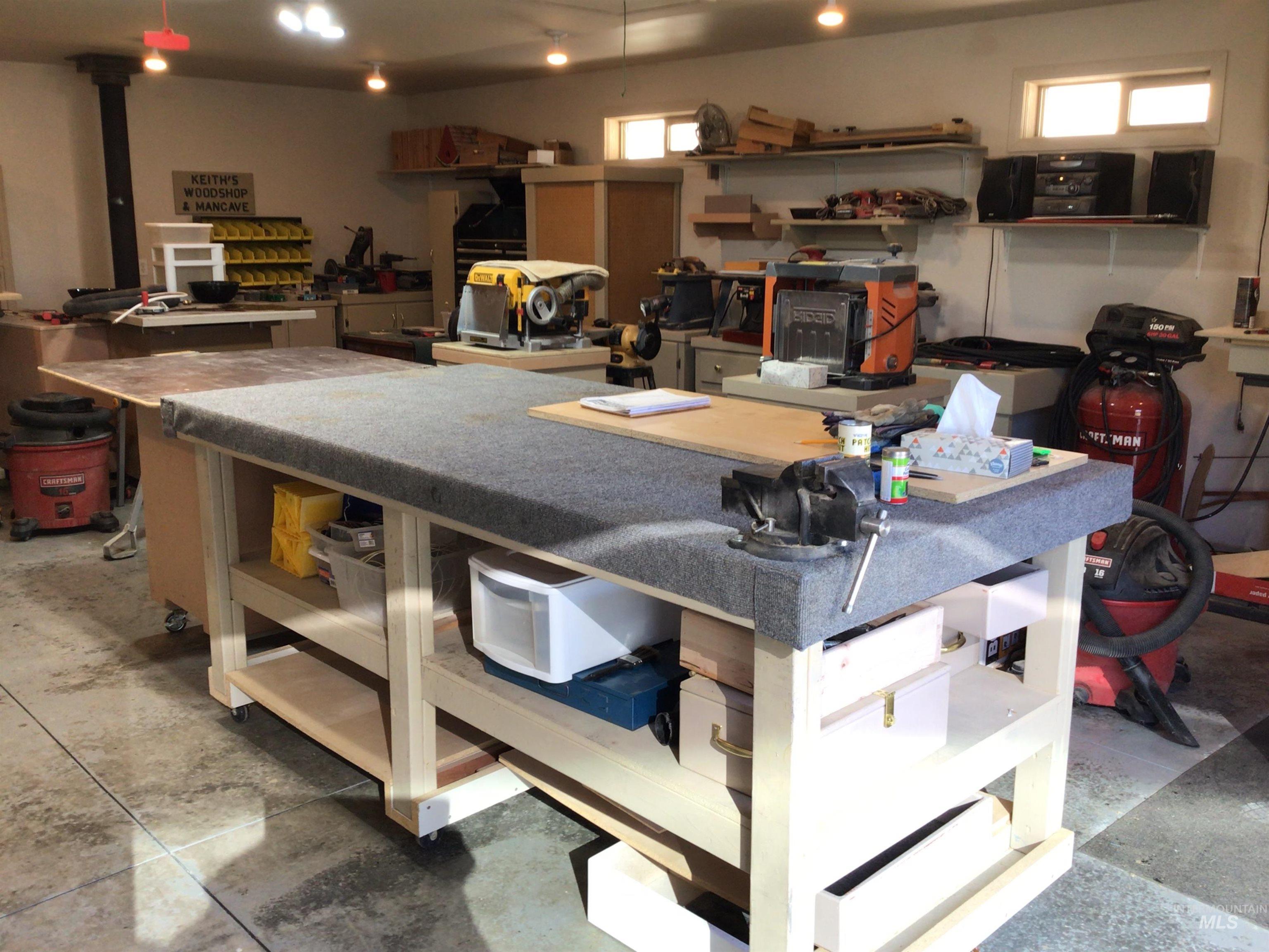 Kitchen with open shelves and a center island