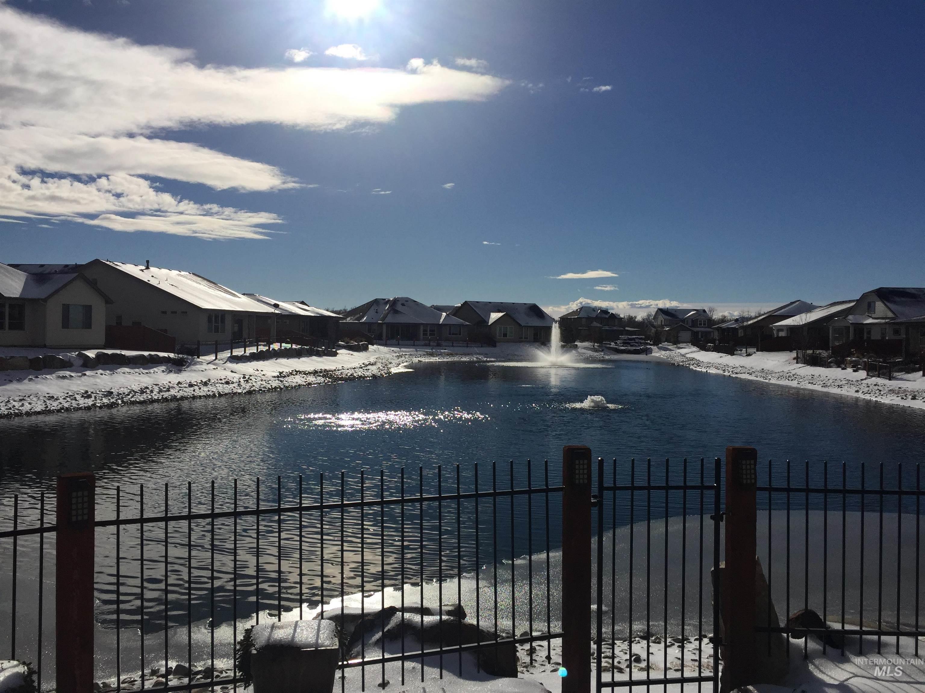 Water view featuring nearby suburban area