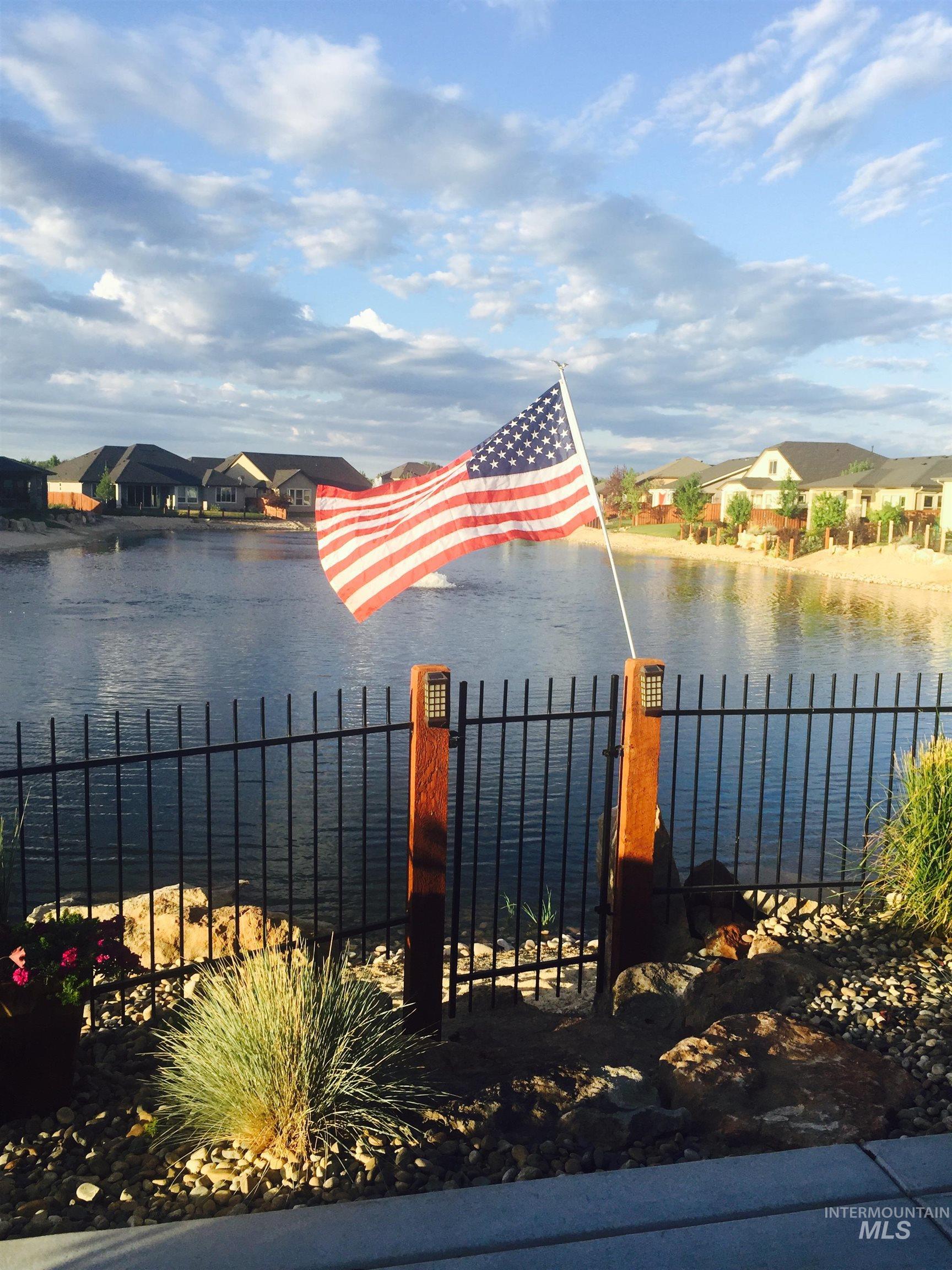Water view with nearby suburban area