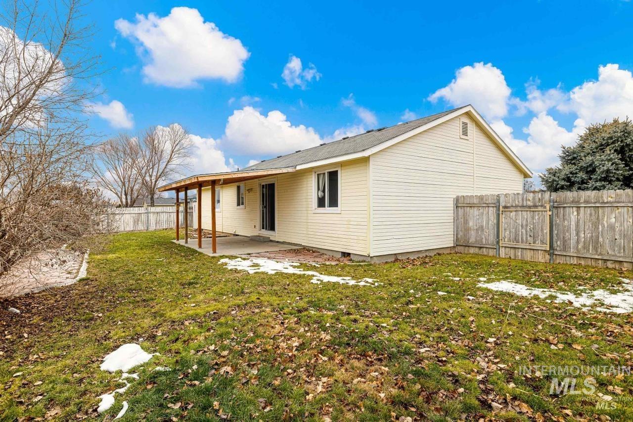 Back of house featuring a patio and a fenced backyard