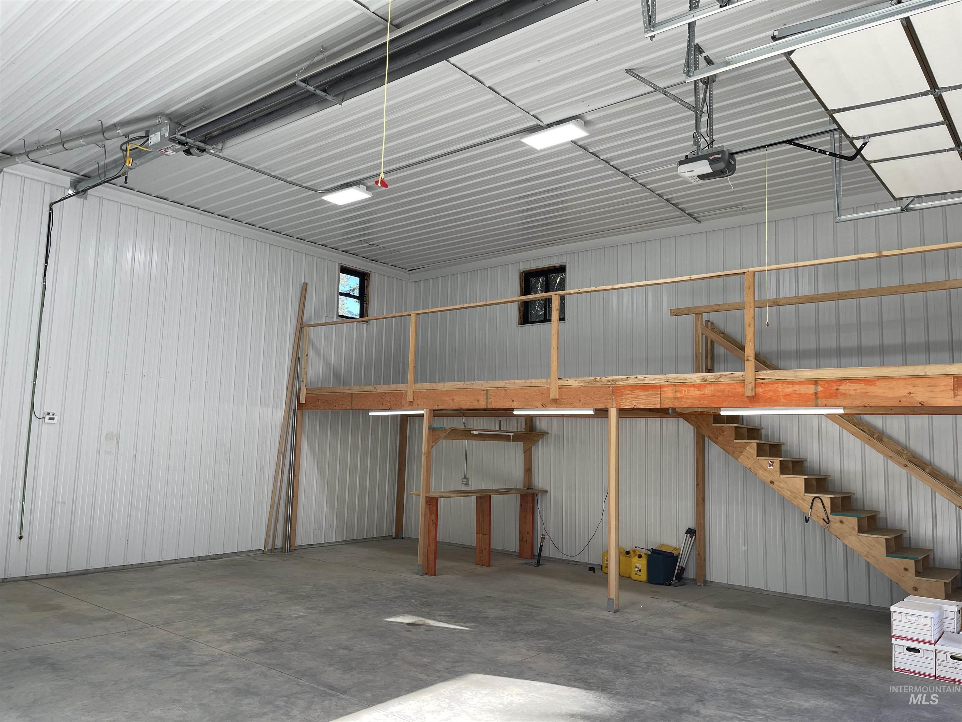 Garage with metal wall and a garage door opener