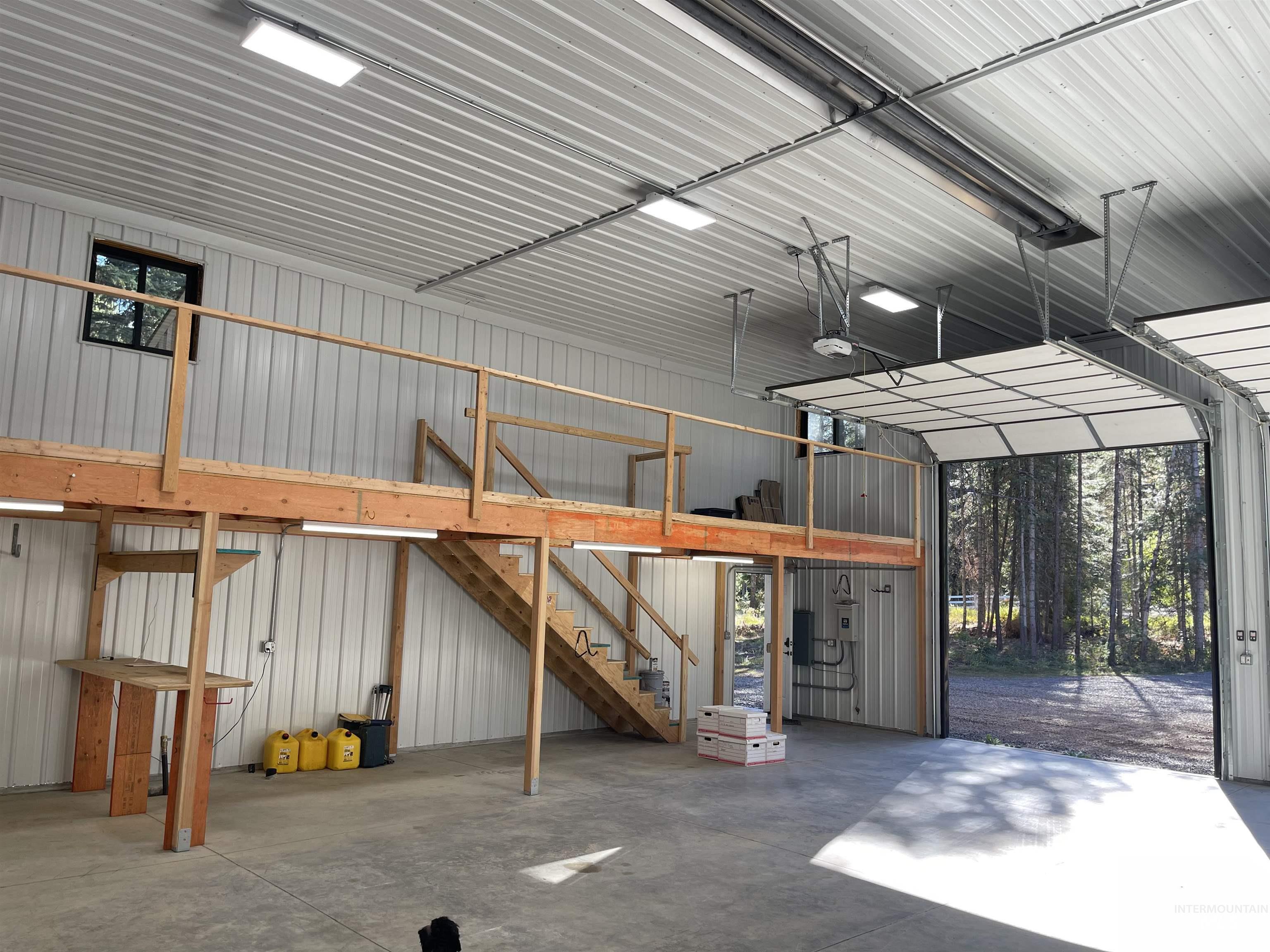 Garage featuring metal wall