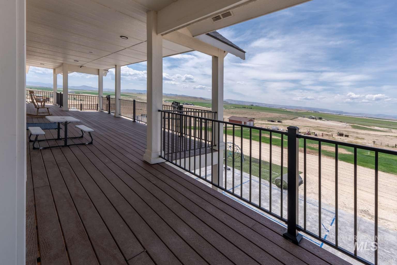 Deck featuring a rural view