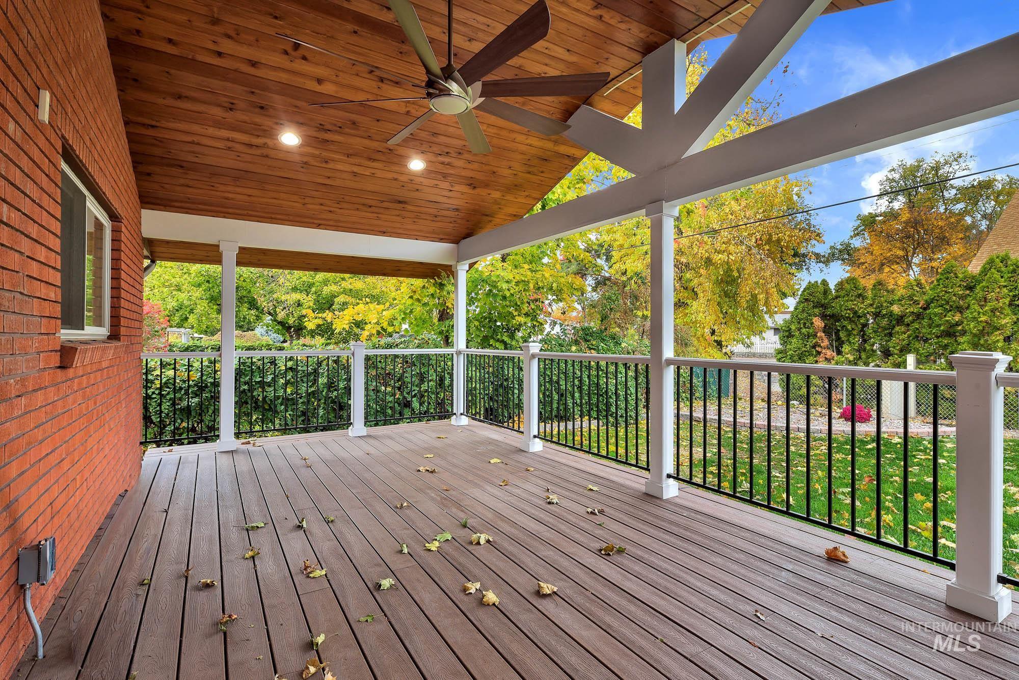 Wooden terrace with ceiling fan