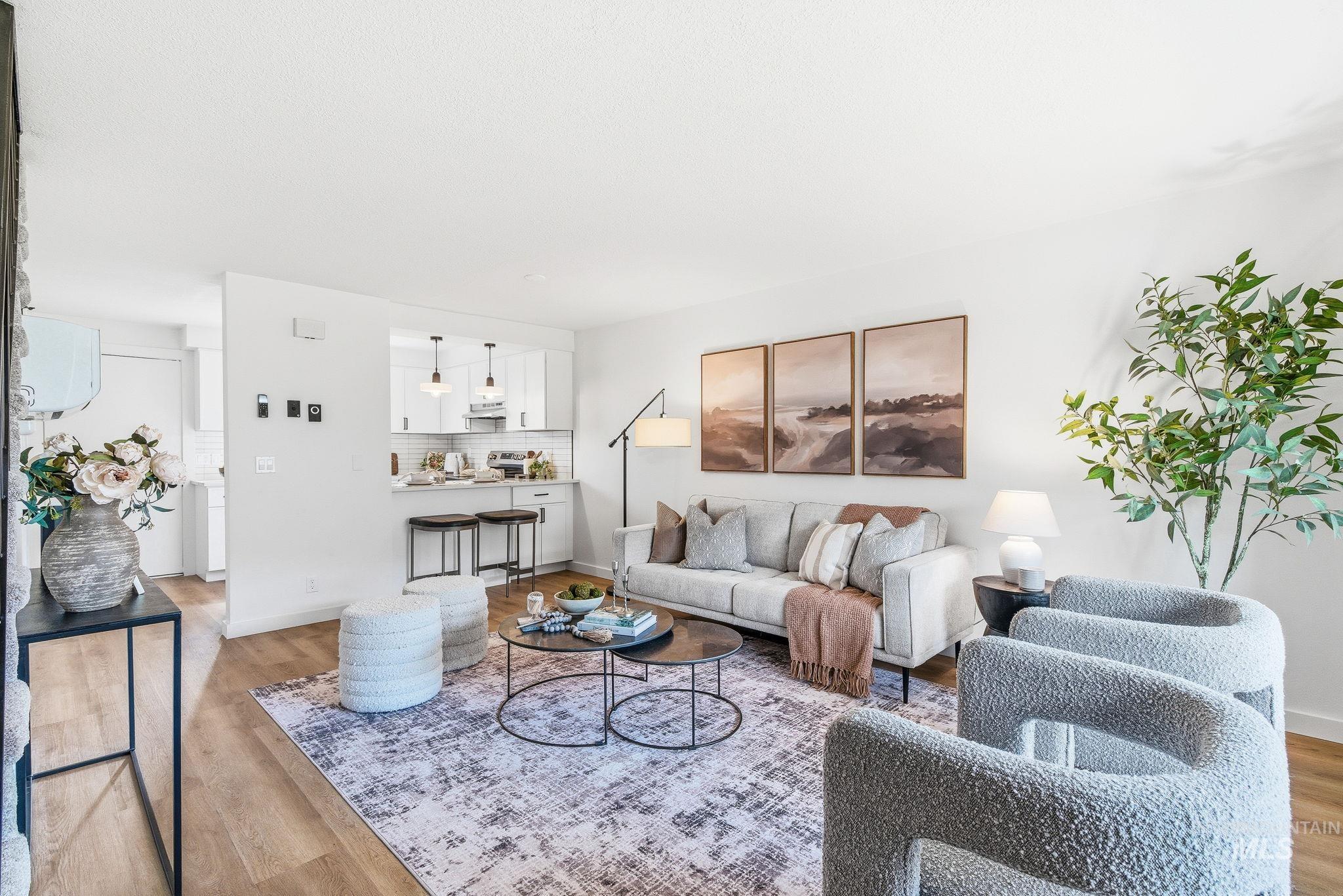 Living room featuring wood finished floors and baseboards