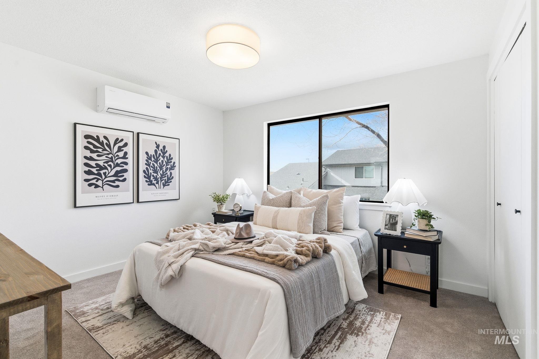 Bedroom featuring carpet floors and a closet