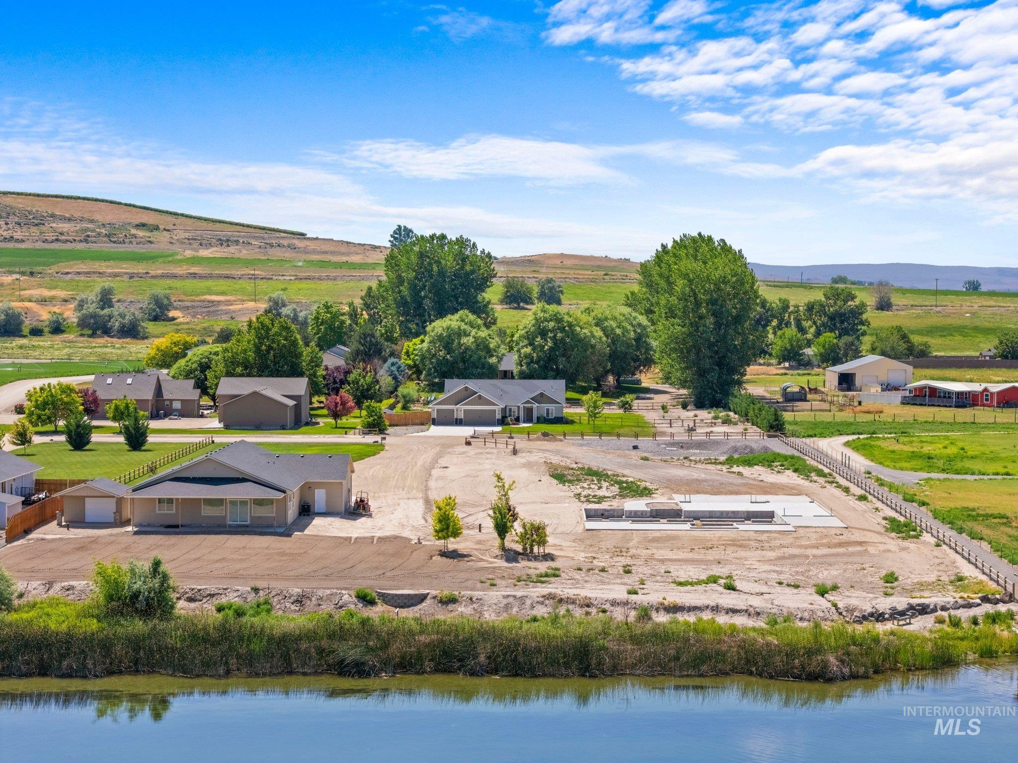 View of subject property featuring a large body of water