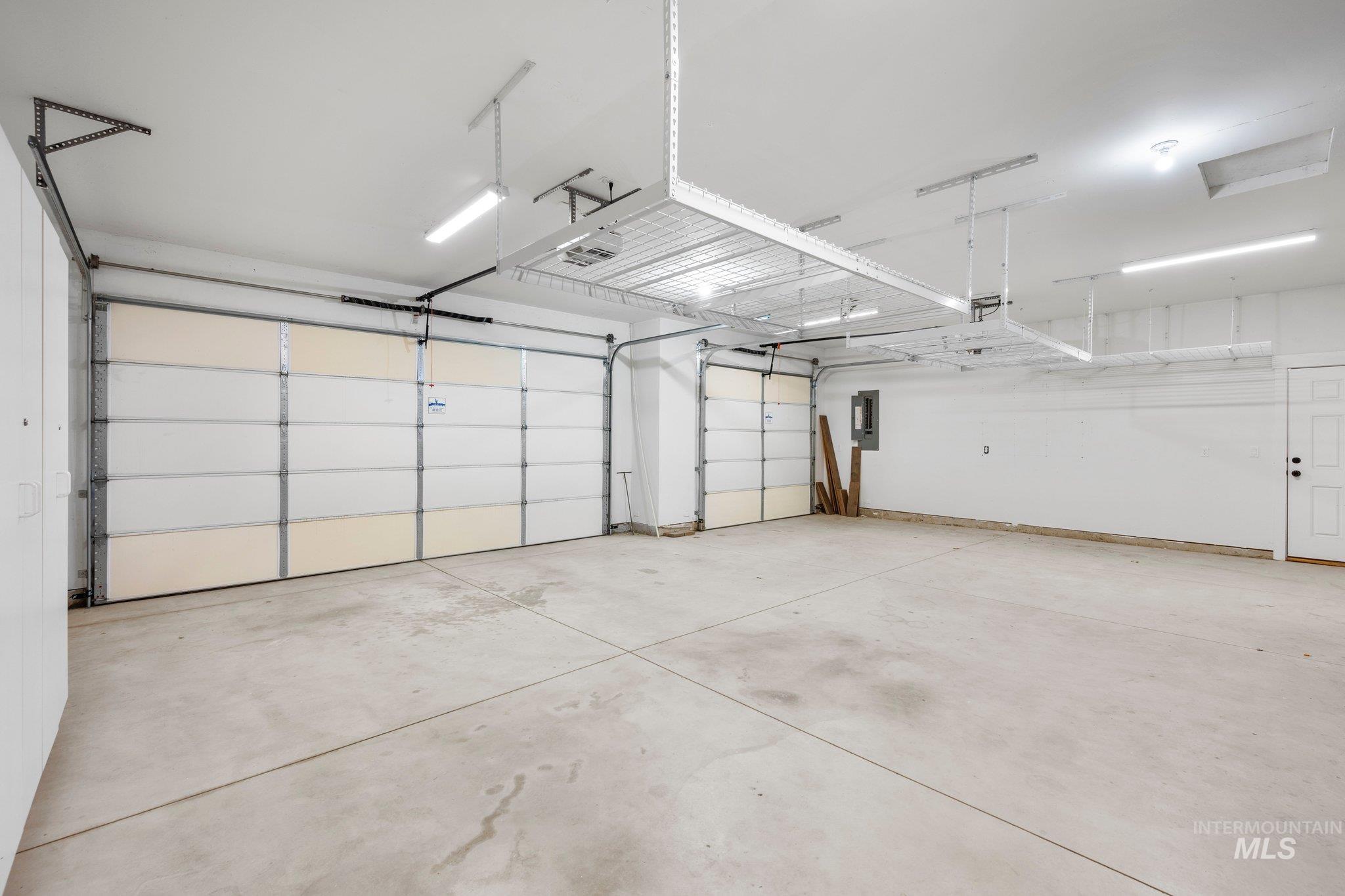 Garage featuring electric panel