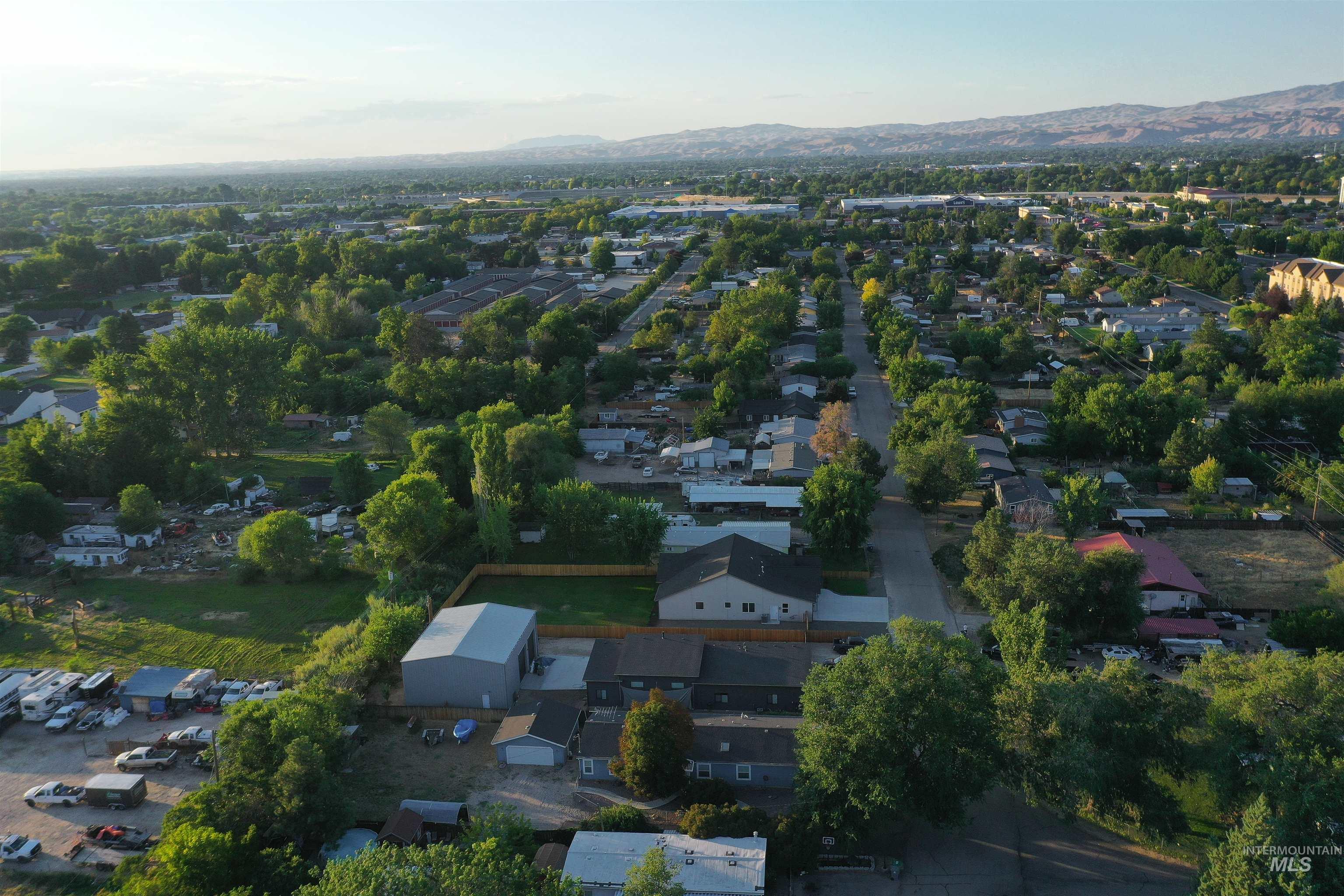 Aerial view of residential area with mountains