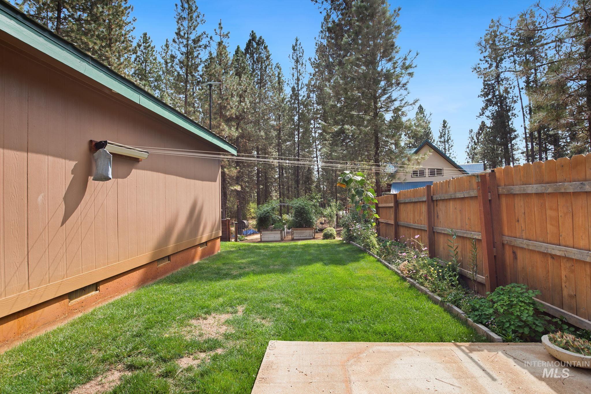 View of fenced backyard
