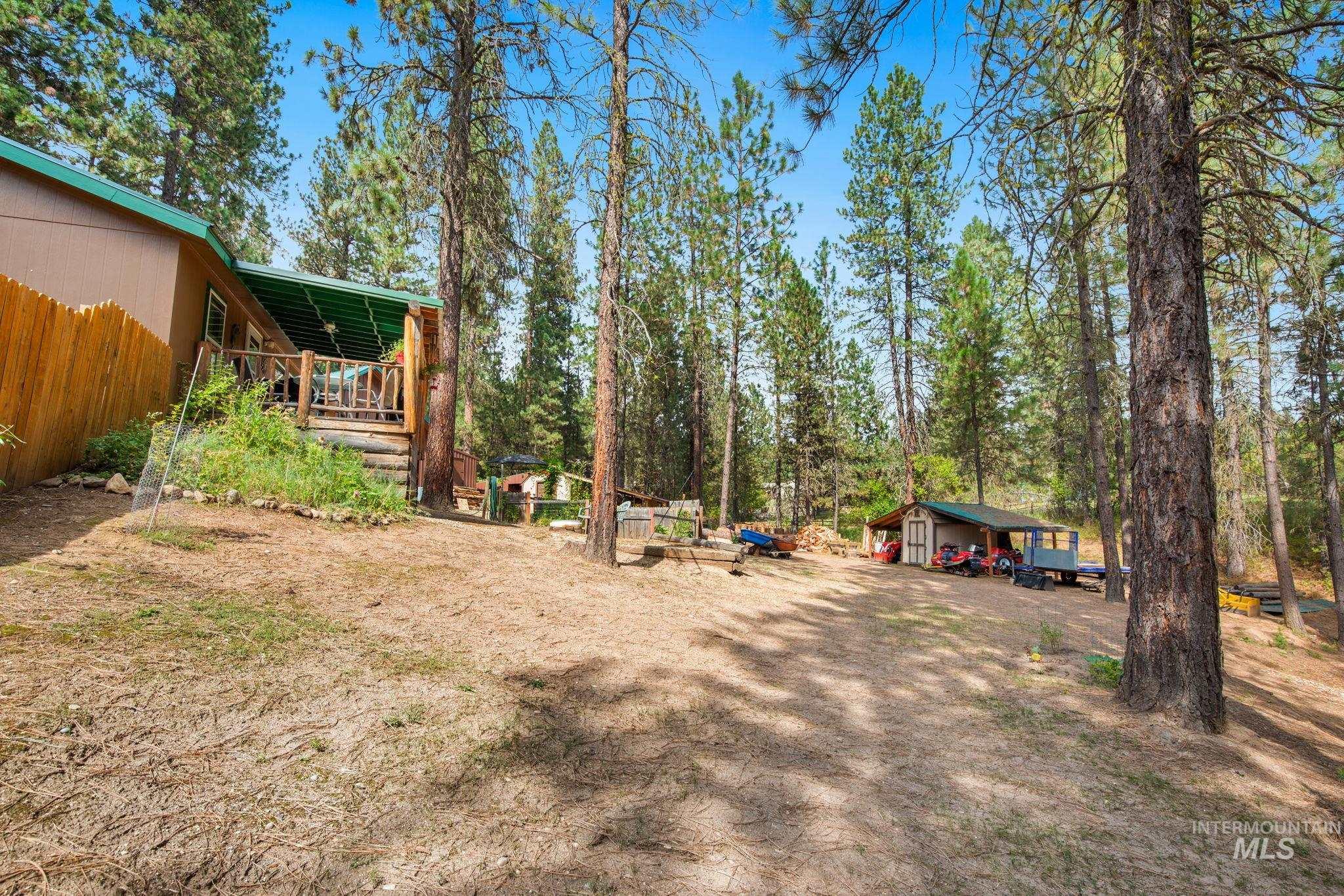 View of yard with a deck