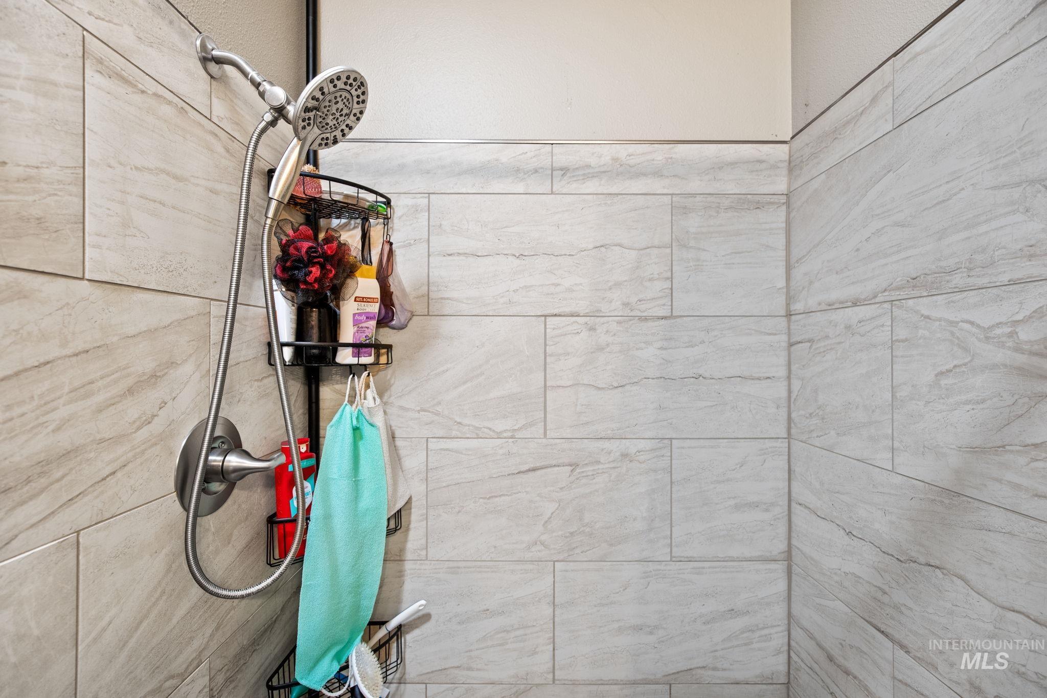 Bathroom view of tiled shower