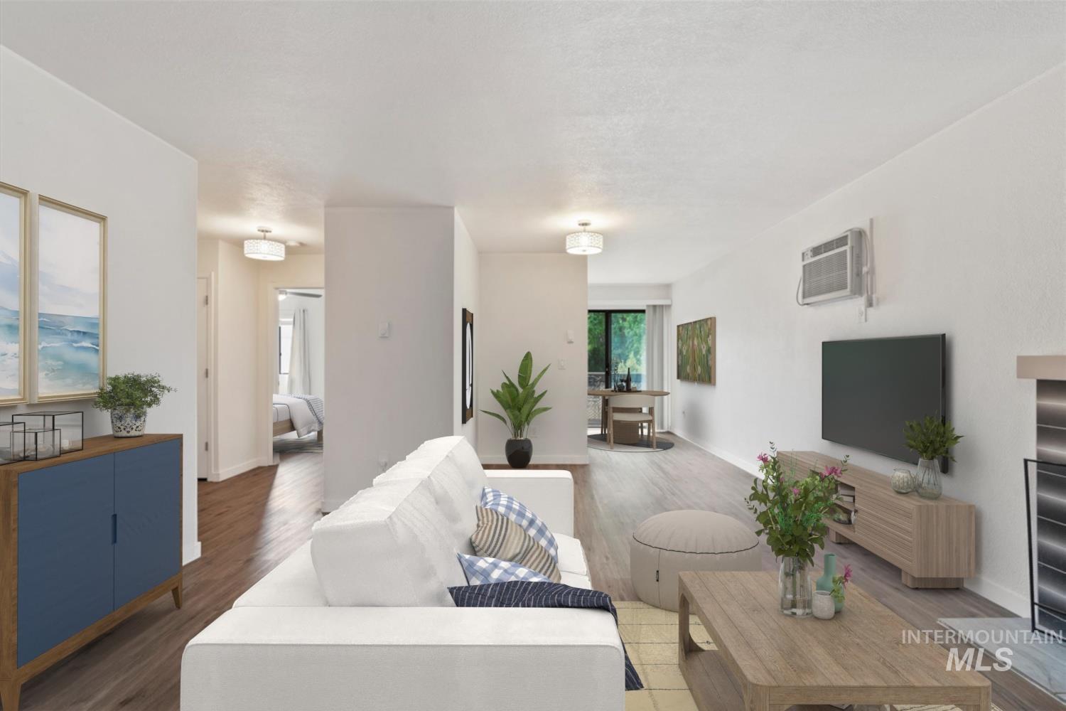Living area featuring light wood-style flooring
