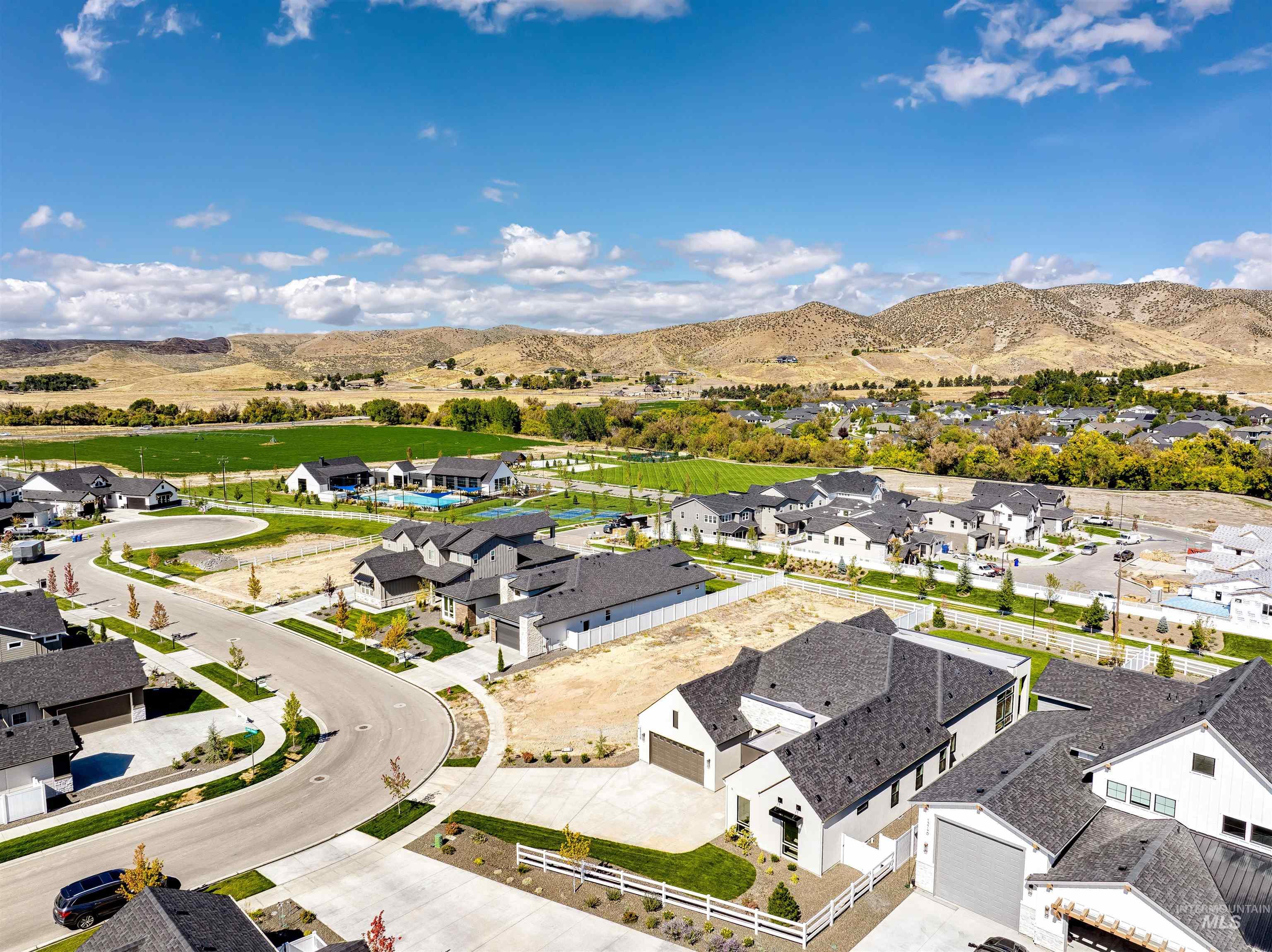 Aerial view of residential area with a mountain backdrop