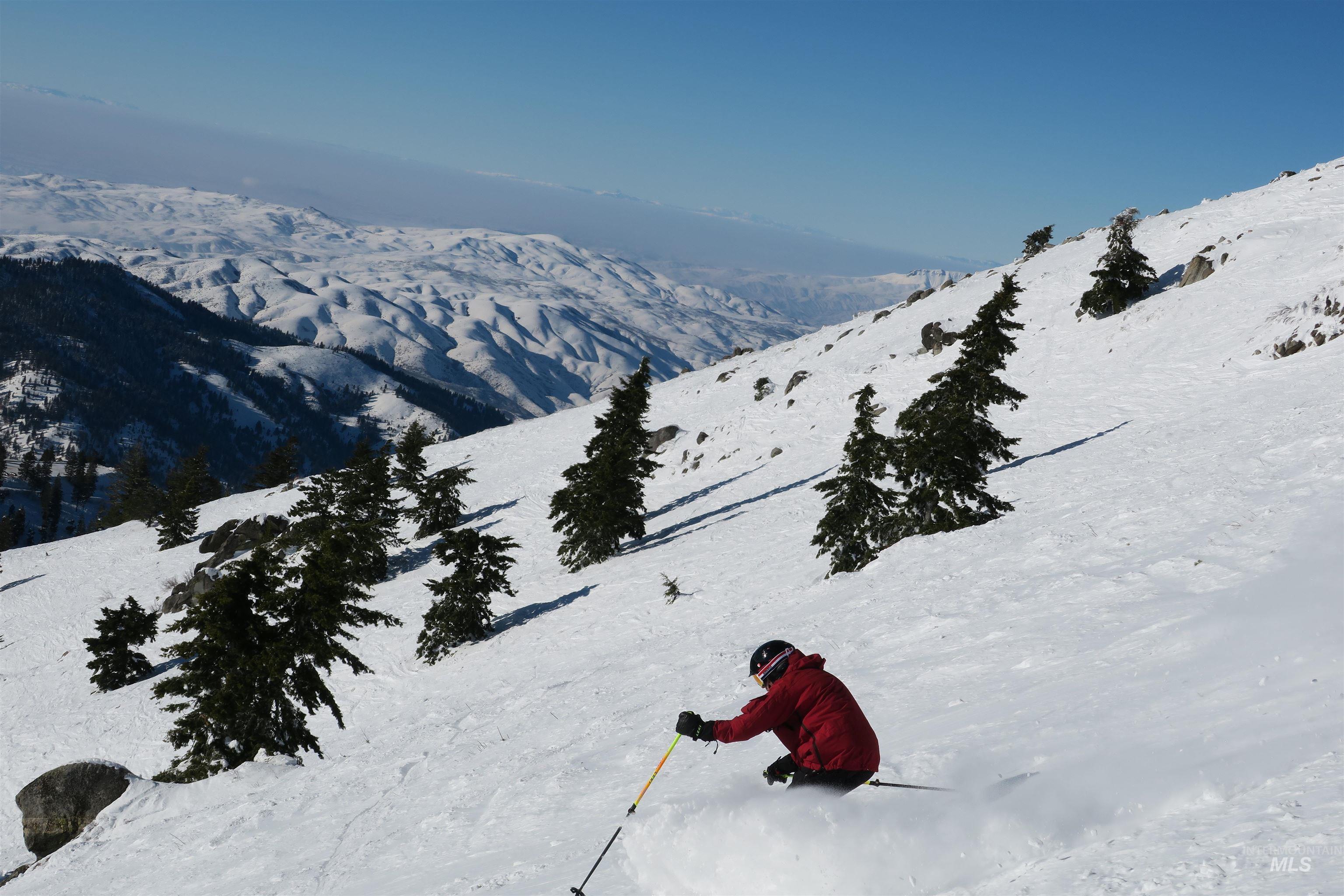 Nearby Bogus Basin ski area with snow-covered slopes, lift access, and mountain views. Ideal setting for winter recreation.