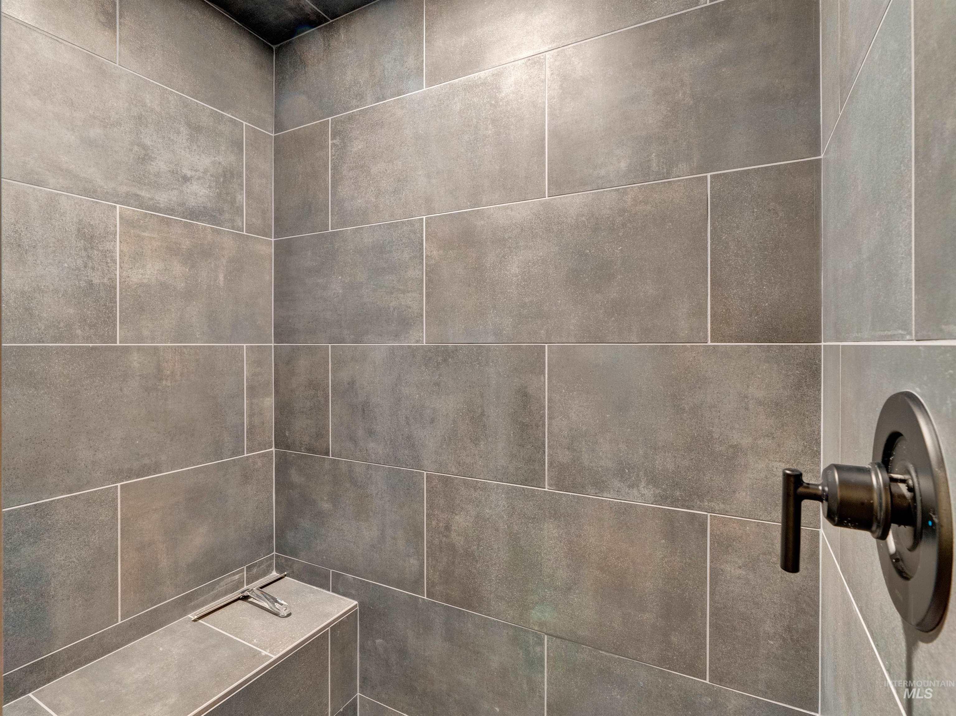 Bathroom view of tiled shower