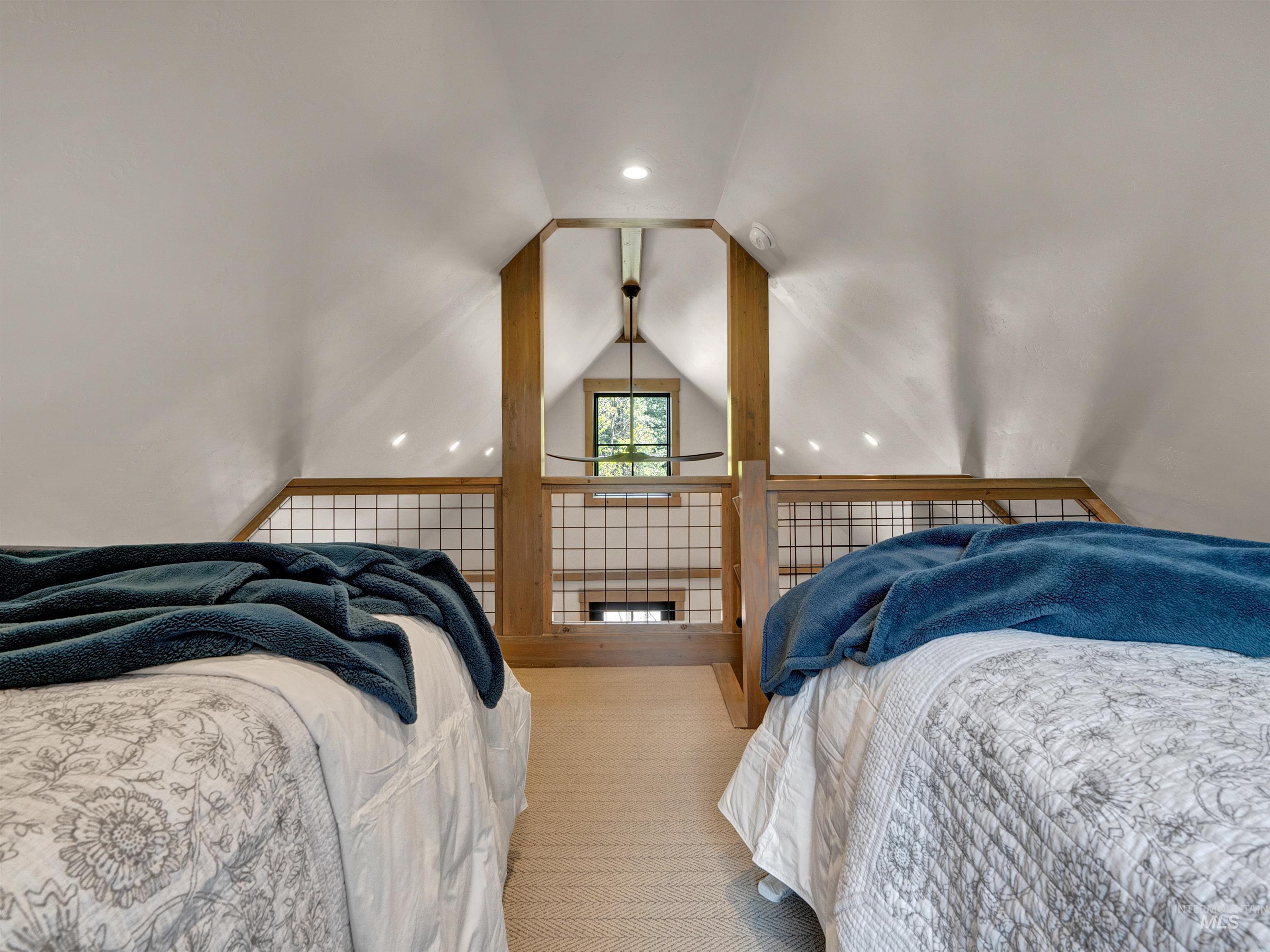 Bedroom with recessed lighting, carpet floors, and beam ceiling