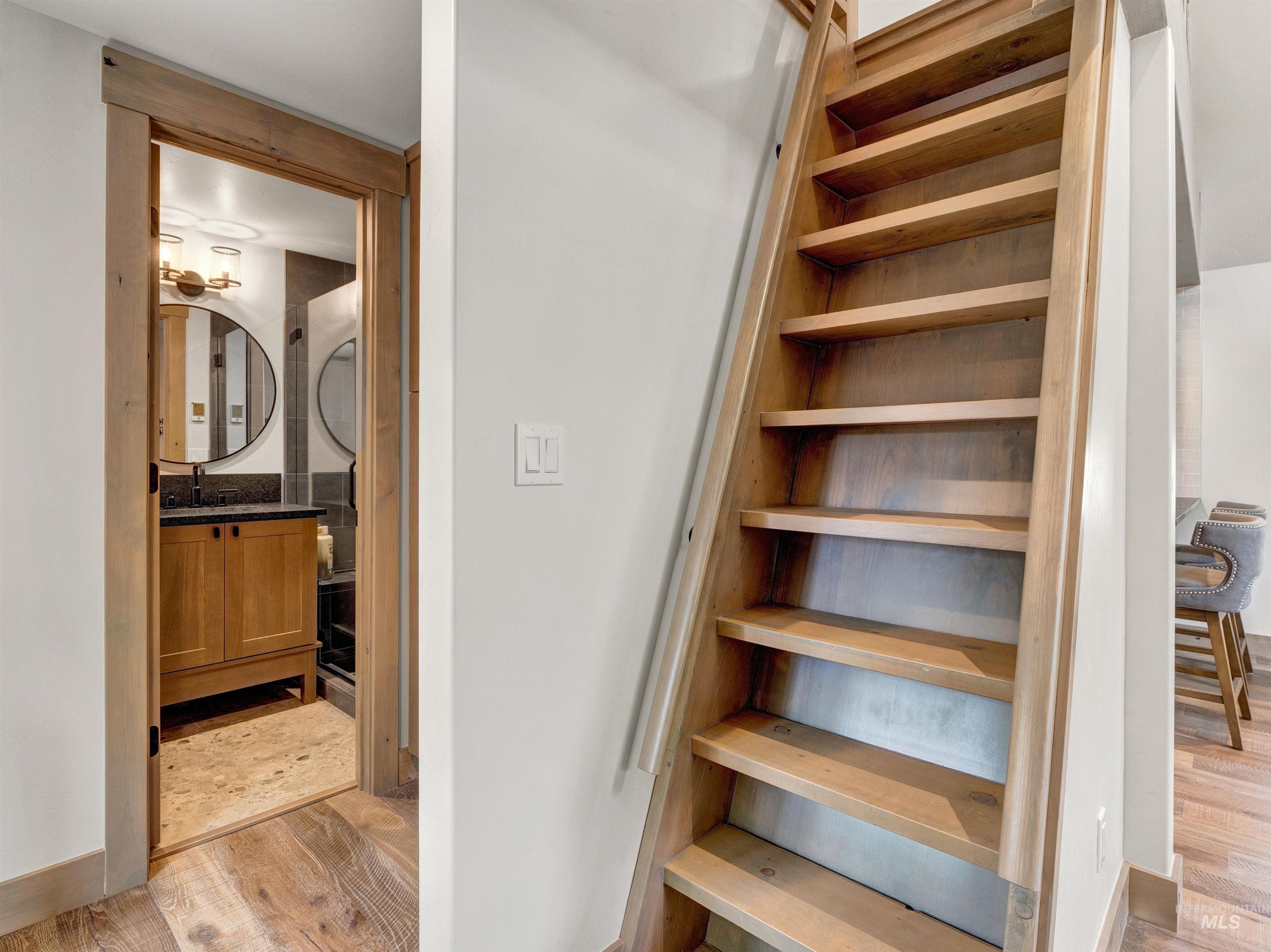 Staircase with wood finished floors