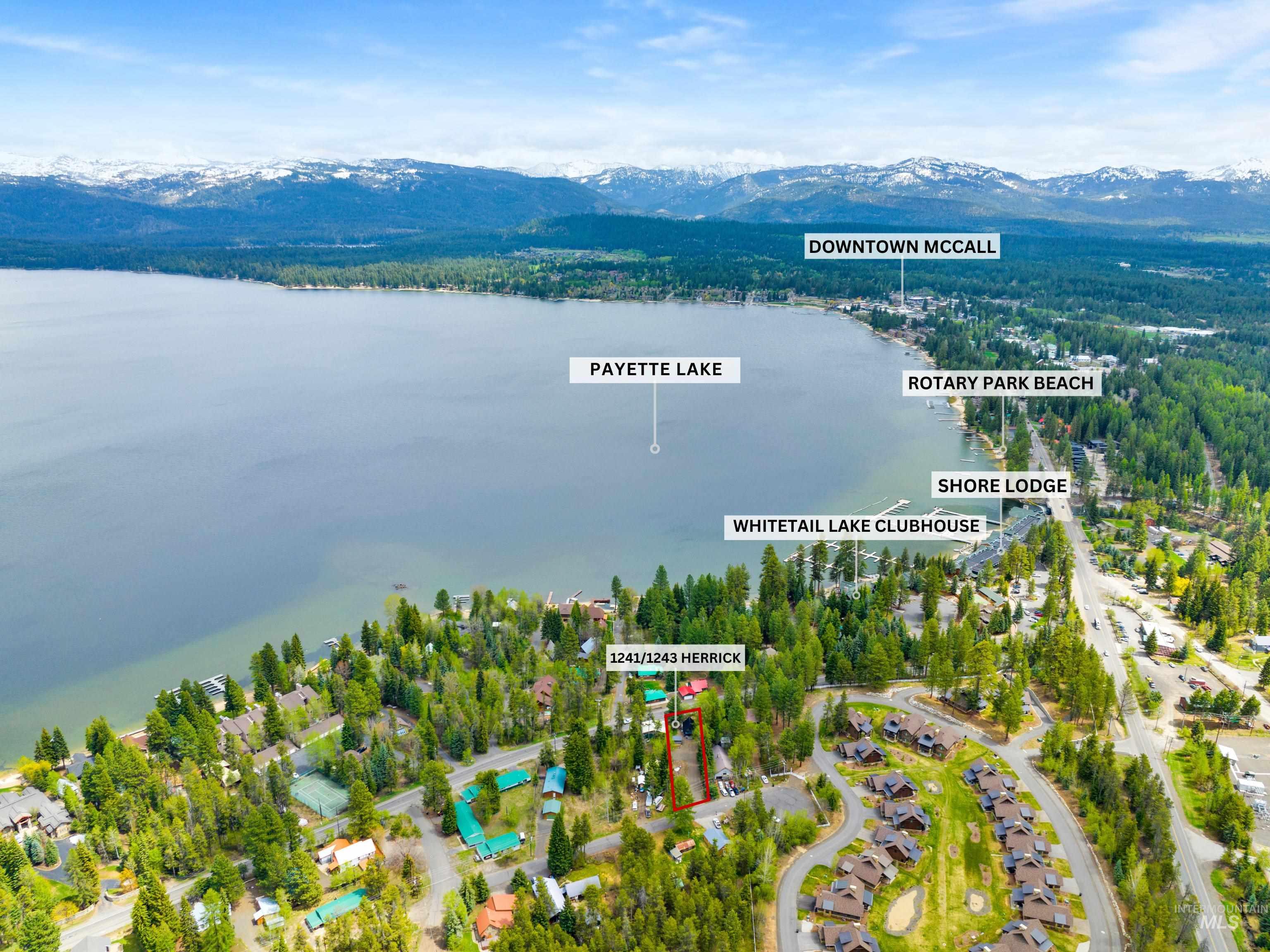 View of property location with a water and mountain view