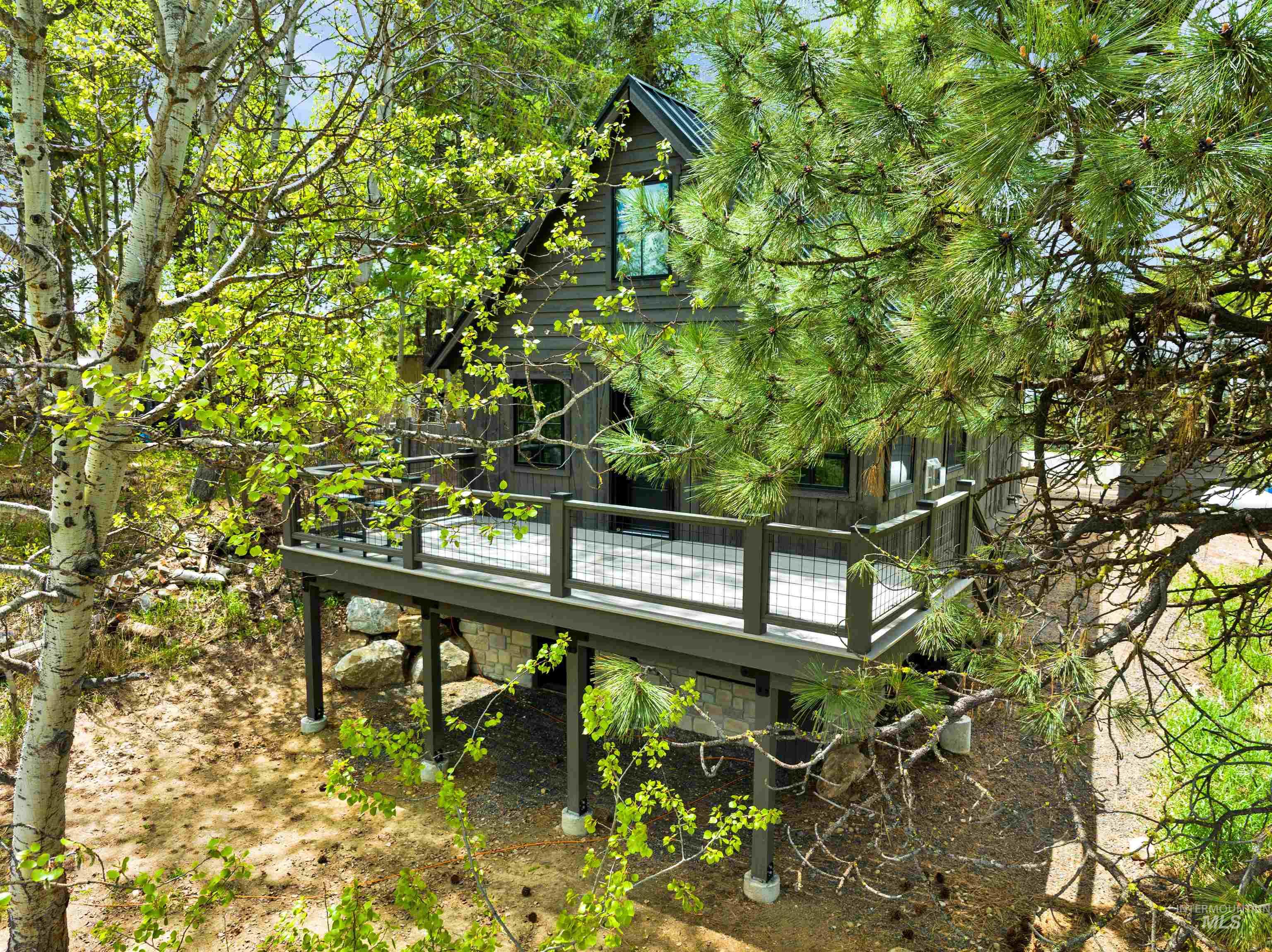 View of home's community with a wooden deck