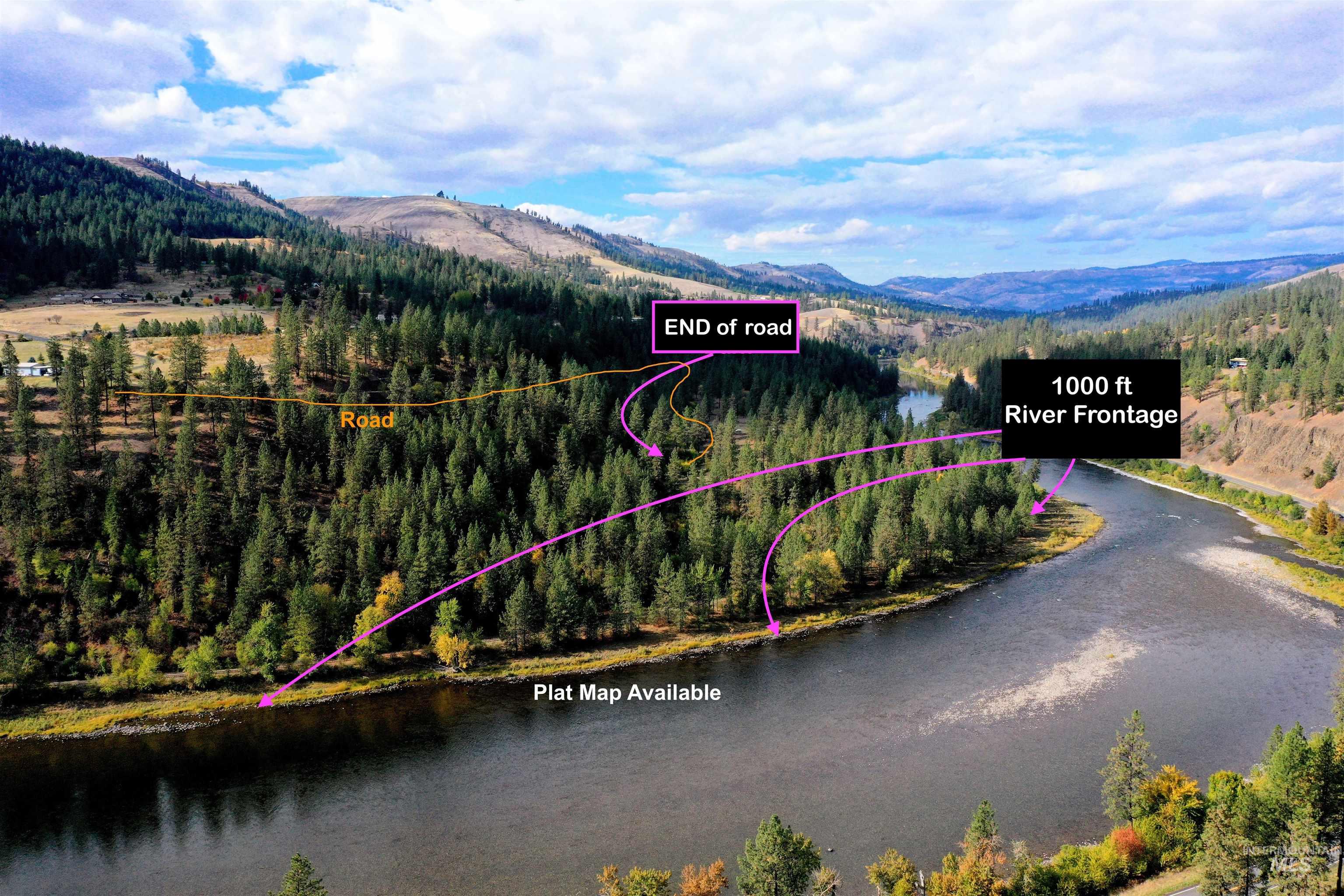 View of property location with property parcel outlined and a water and mountain view