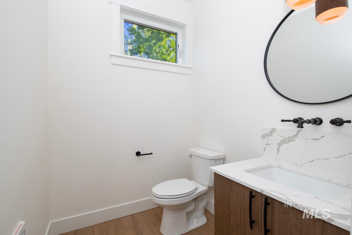 Bathroom with vanity and light wood-style floors