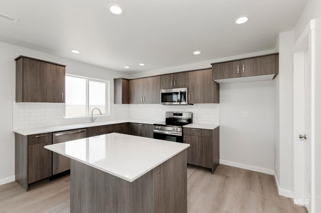 Photo of 18403 N Trumpet Lily Ave, Nampa, ID 83687 (MLS # 98972721)