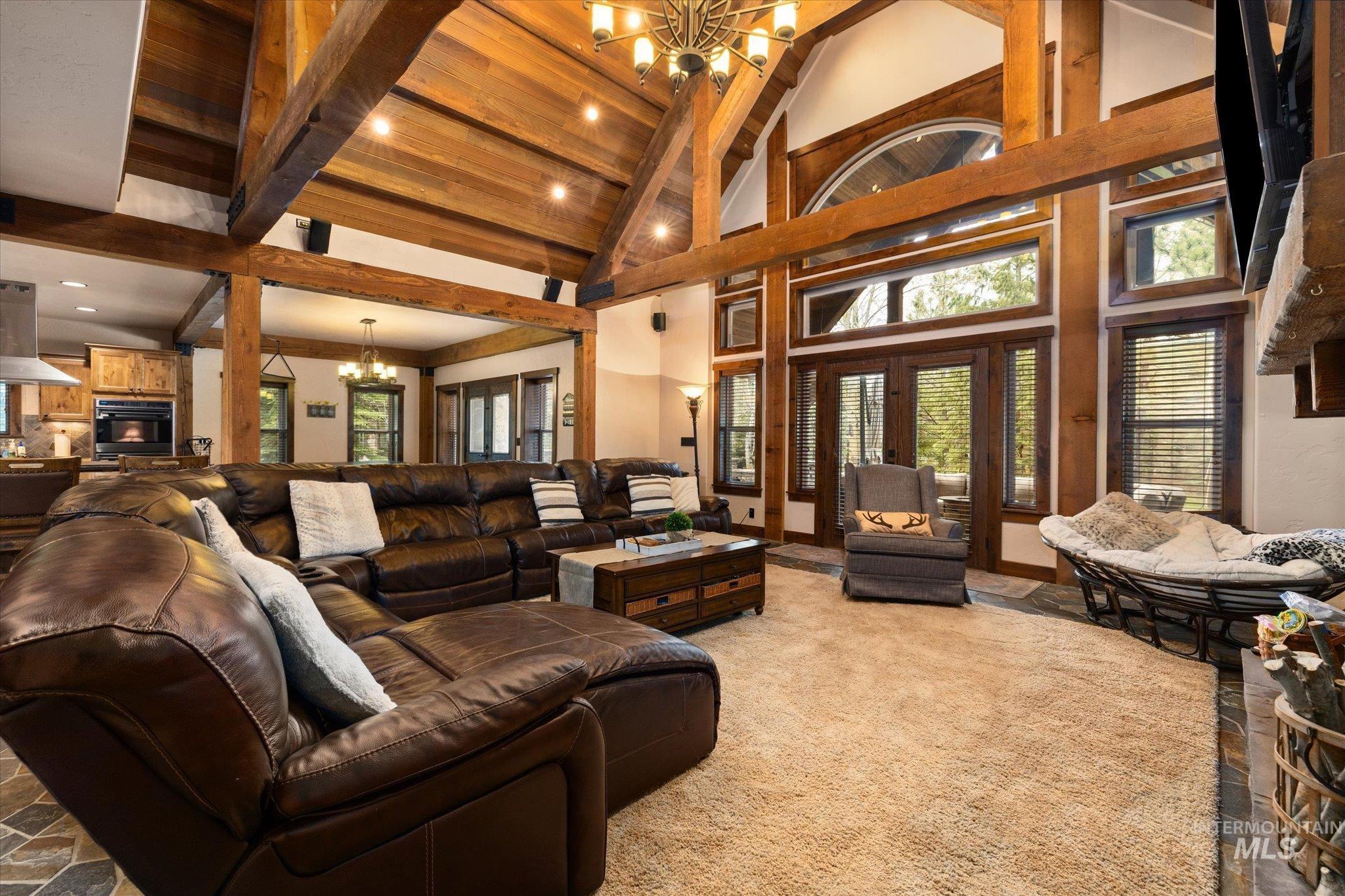 Vaulted wood-finish ceiling with exposed beams