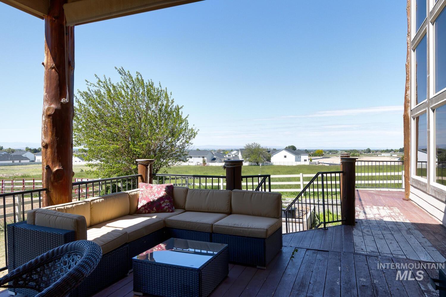 Wooden terrace featuring outdoor lounge area