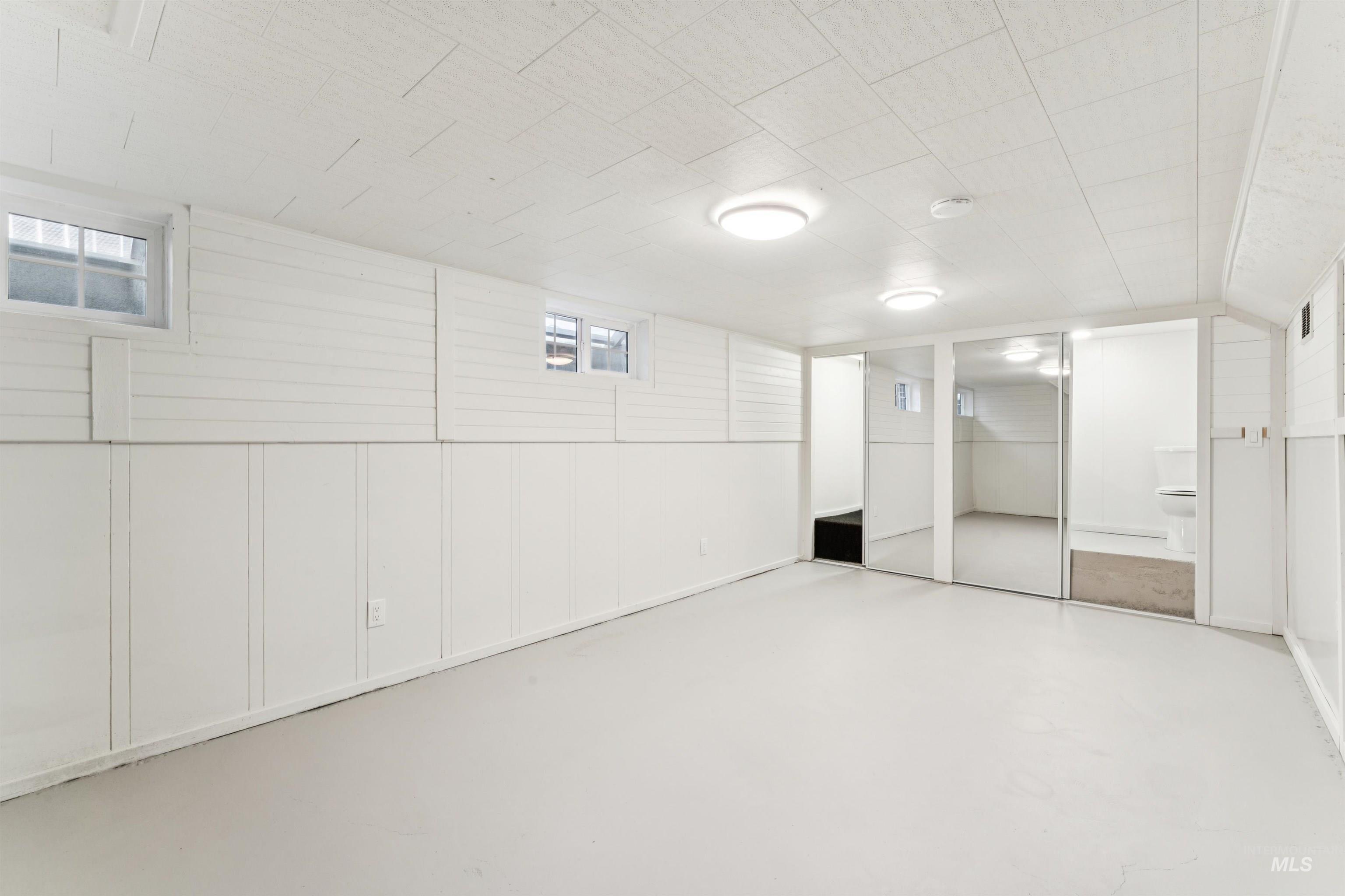 Below grade area with wooden walls