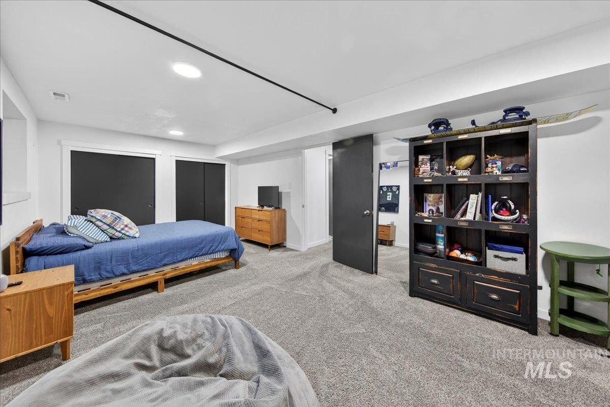 Bedroom featuring carpet floors and recessed lighting